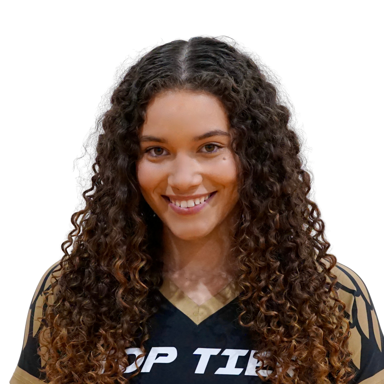 A young woman with long, curly brown hair and light brown eyes smiling at the camera, wearing a black and gold sports jersey.