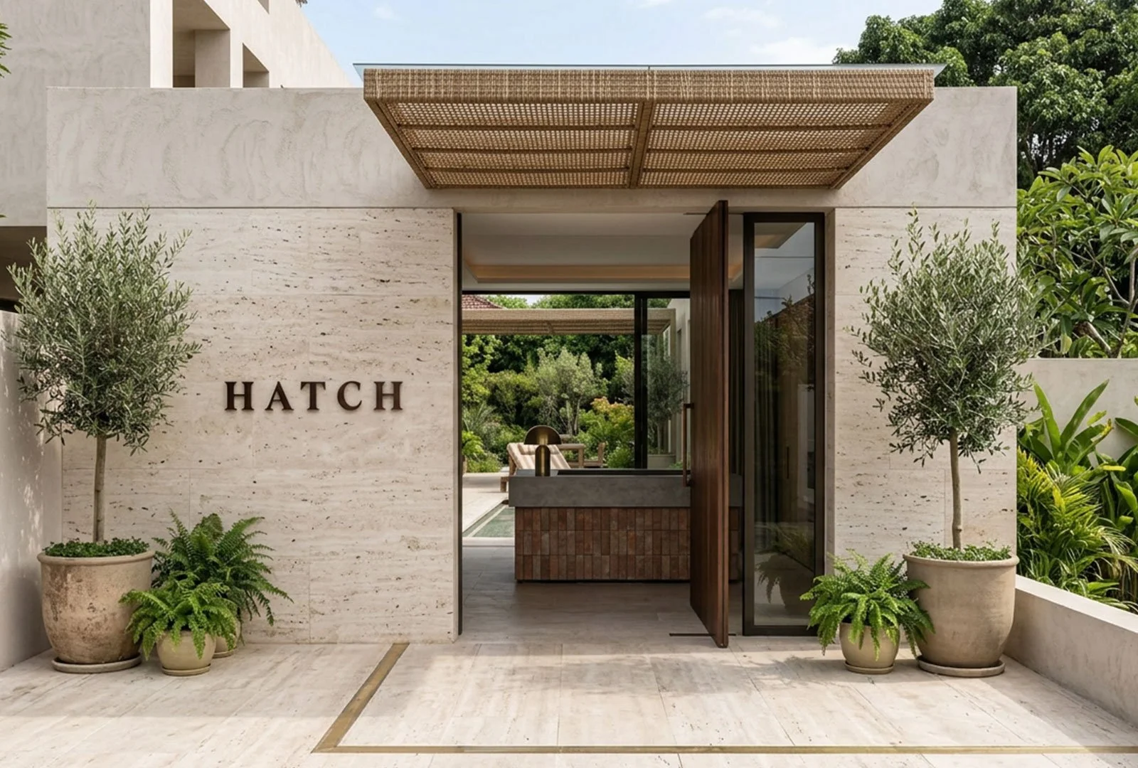 A nicely designed hotel exterior in Bali with Hatch Signage.
