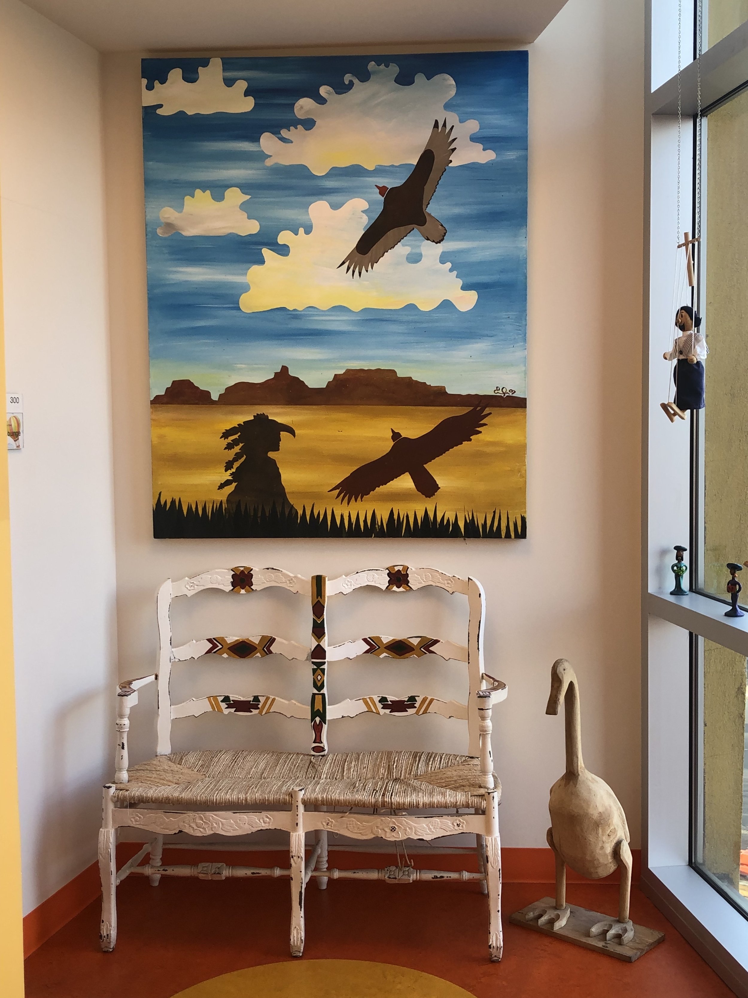 native american bench and painting.jpg