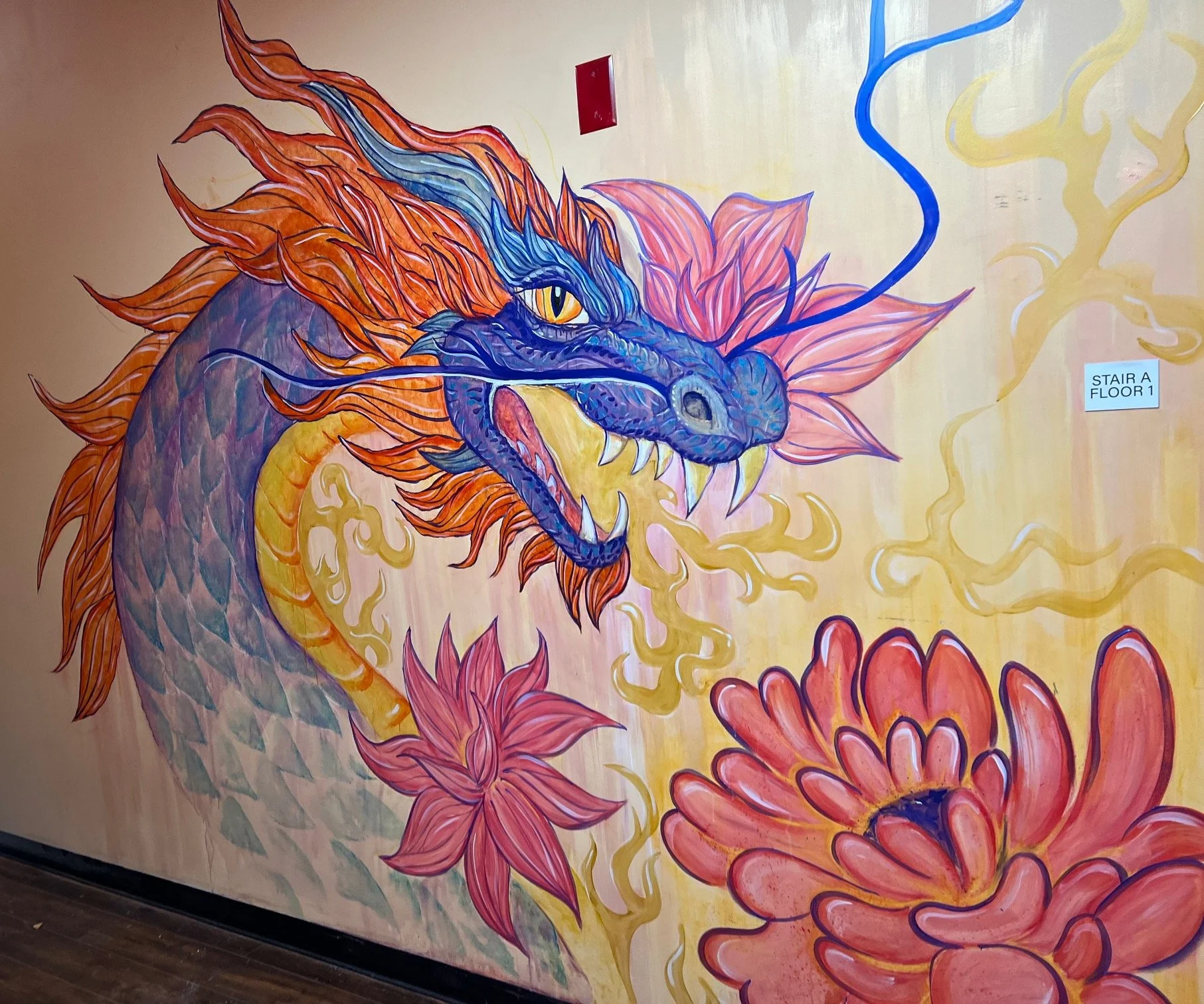 Dragon Mural for staircase entryway, the painted tail follows up 5 flights.