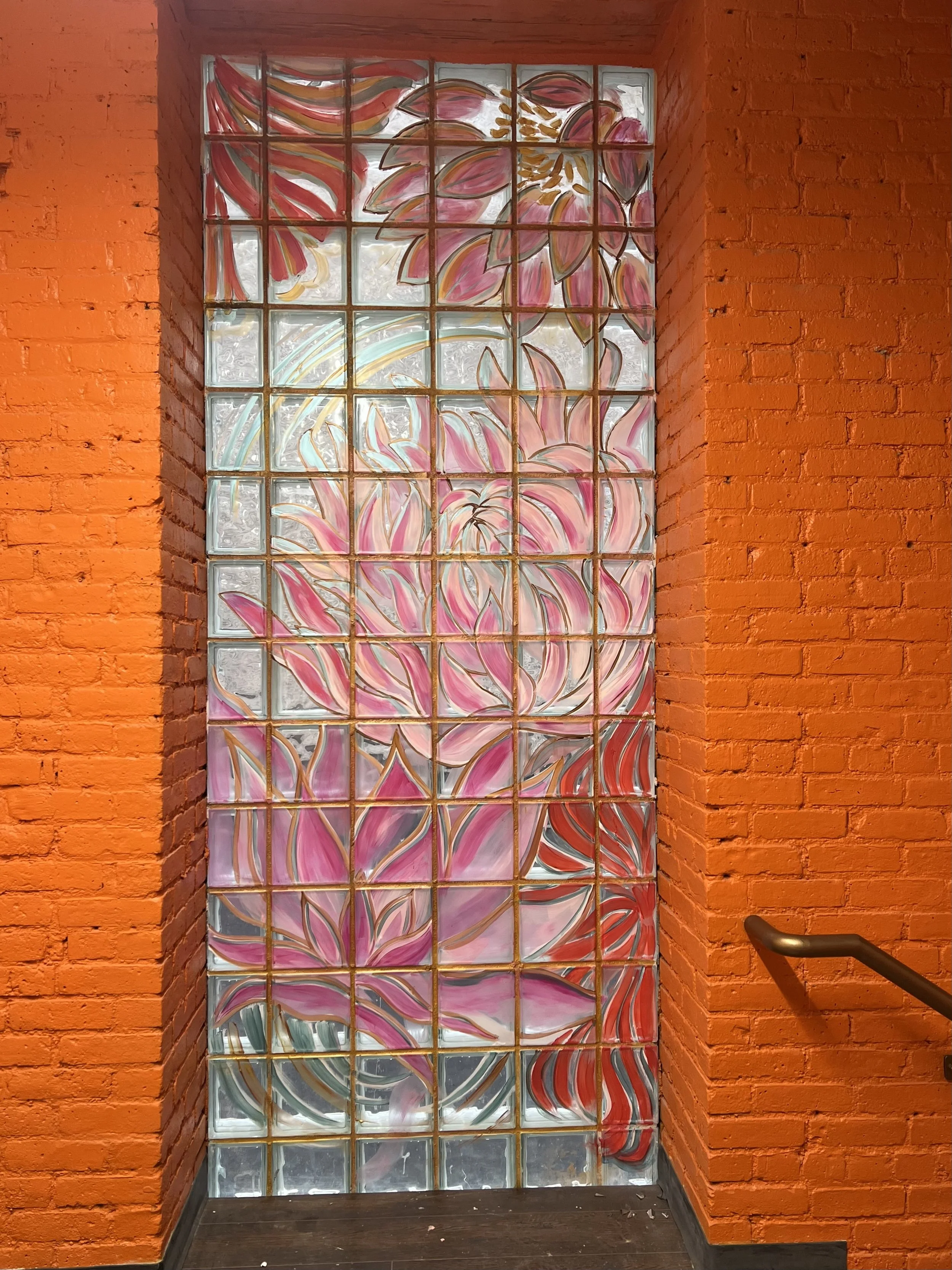 Windows are painted with Lotus motifs.