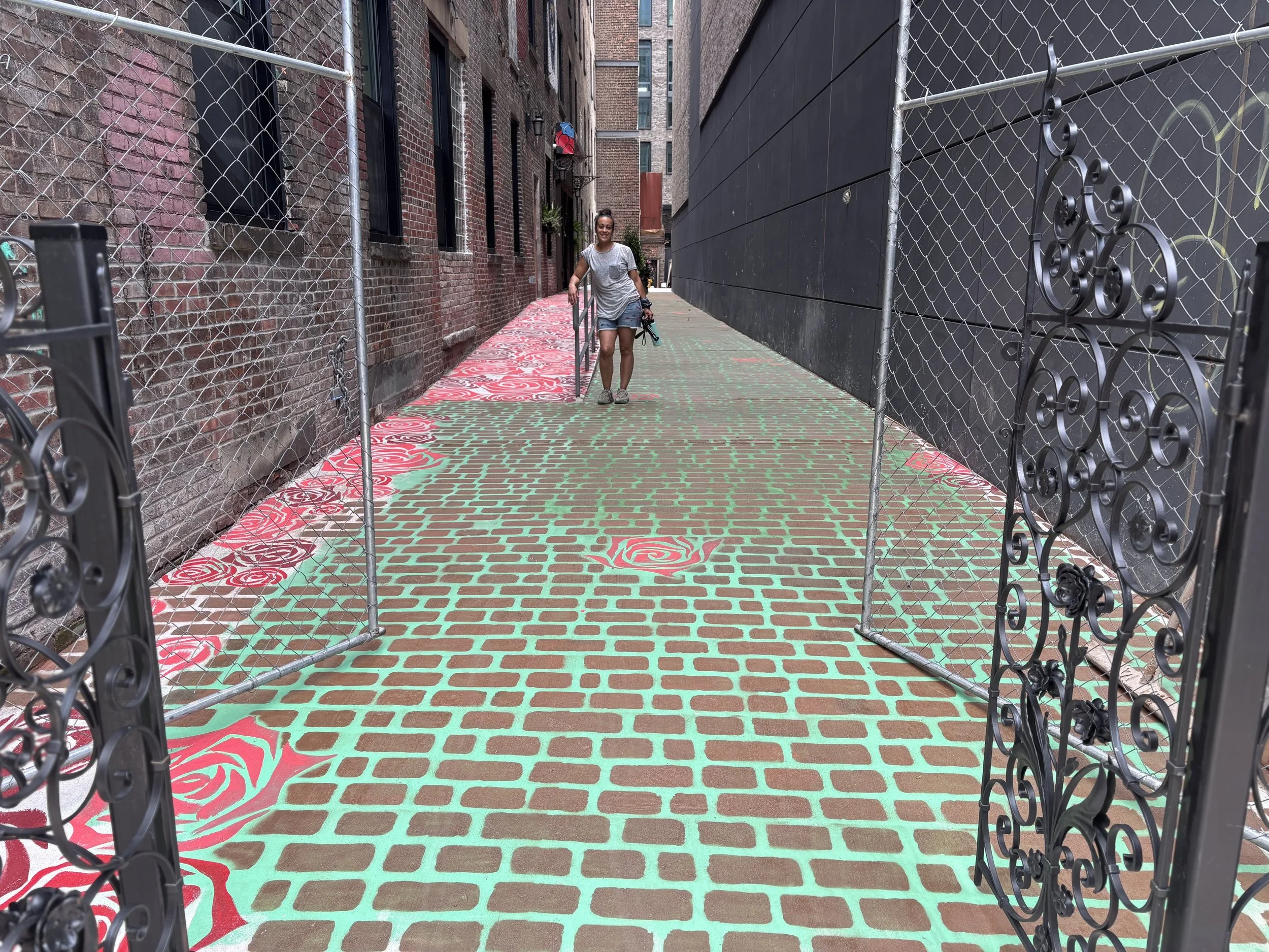 Exterior entryway of the building - including a vintage cobble stone floor mural over 120 ft long.