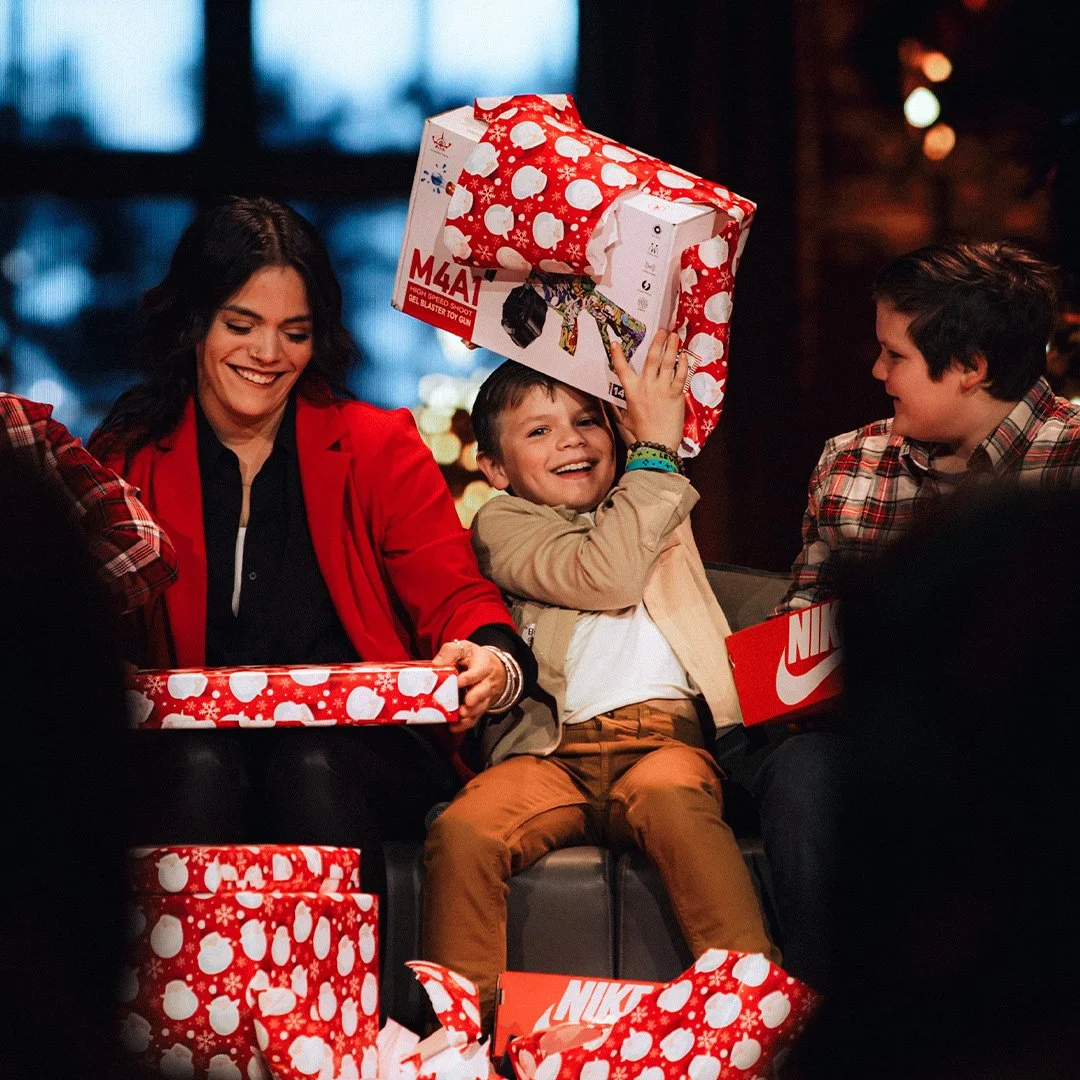 Photo of Familiy opening Gifts.jpg