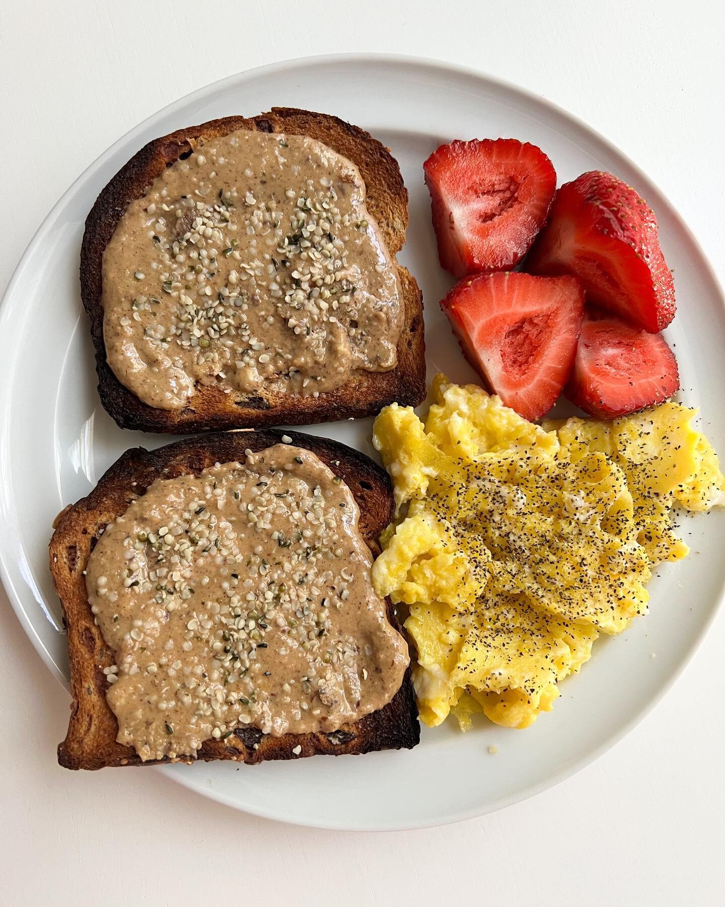 Anyone else moving extra slowww today? We may be slow, but we&rsquo;re fueled 💯

@daveskillerbread cinnamon raisin toast with @micheles_granola new oat &amp; nut butter spread (amazing), scrambled eggs, and 🍓

Carbs ✅ protein ✅ fat ✅ gangs all here