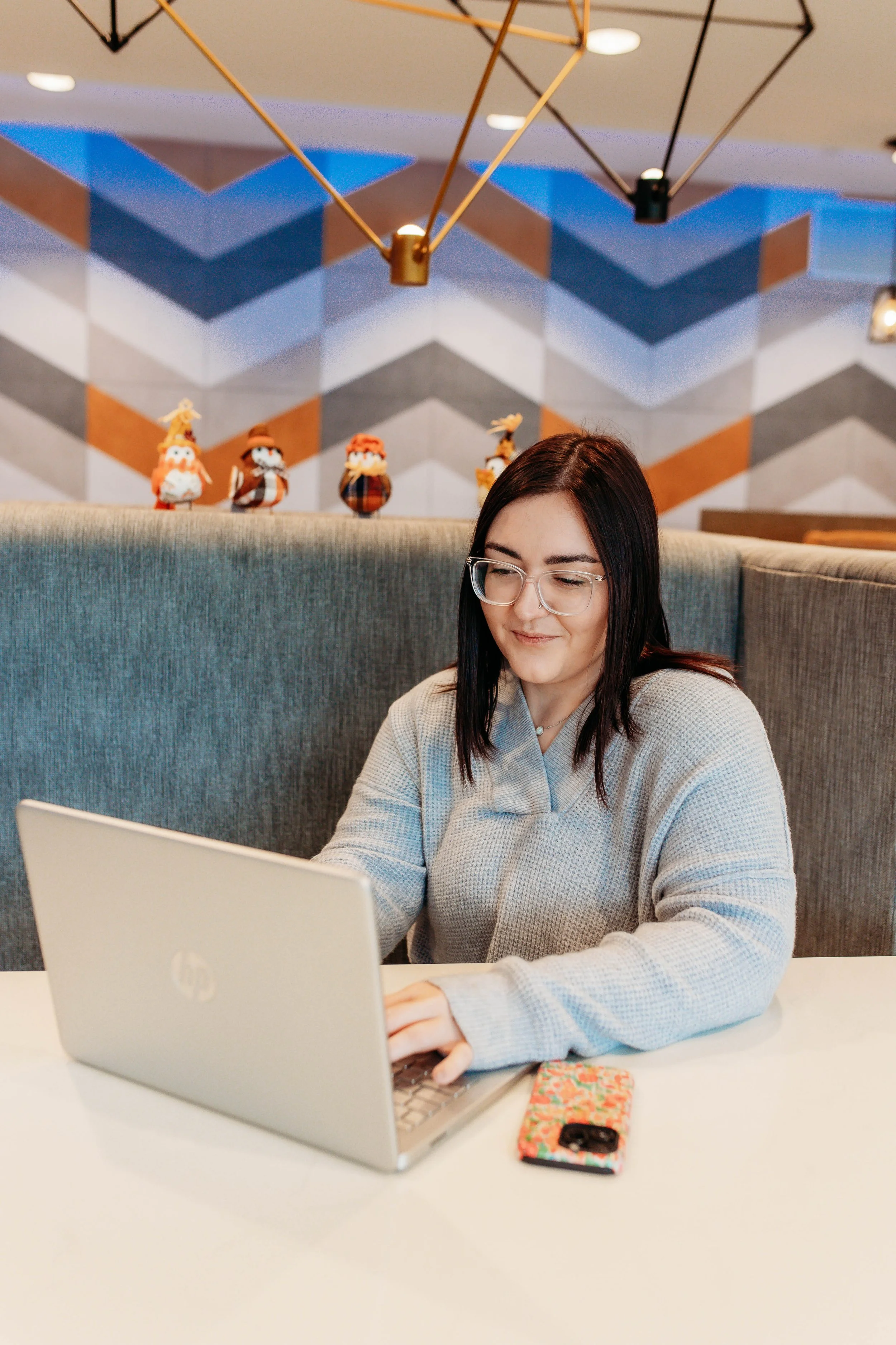 erin-typing-on-laptop-creating-website