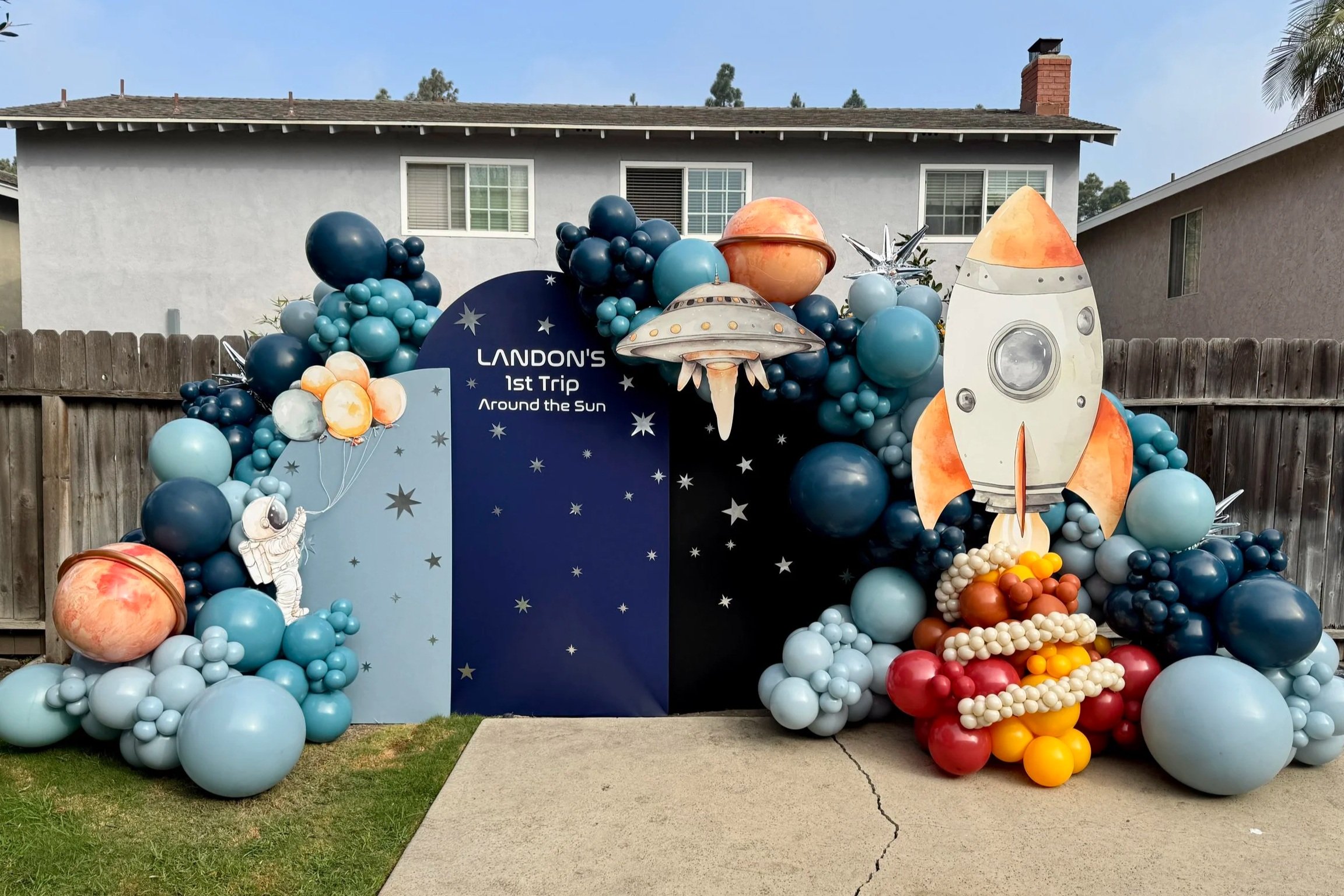 space themed balloon decor setups in orange county with backdrops
