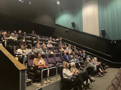 a group of 50 or so attendees of the cultural learning event