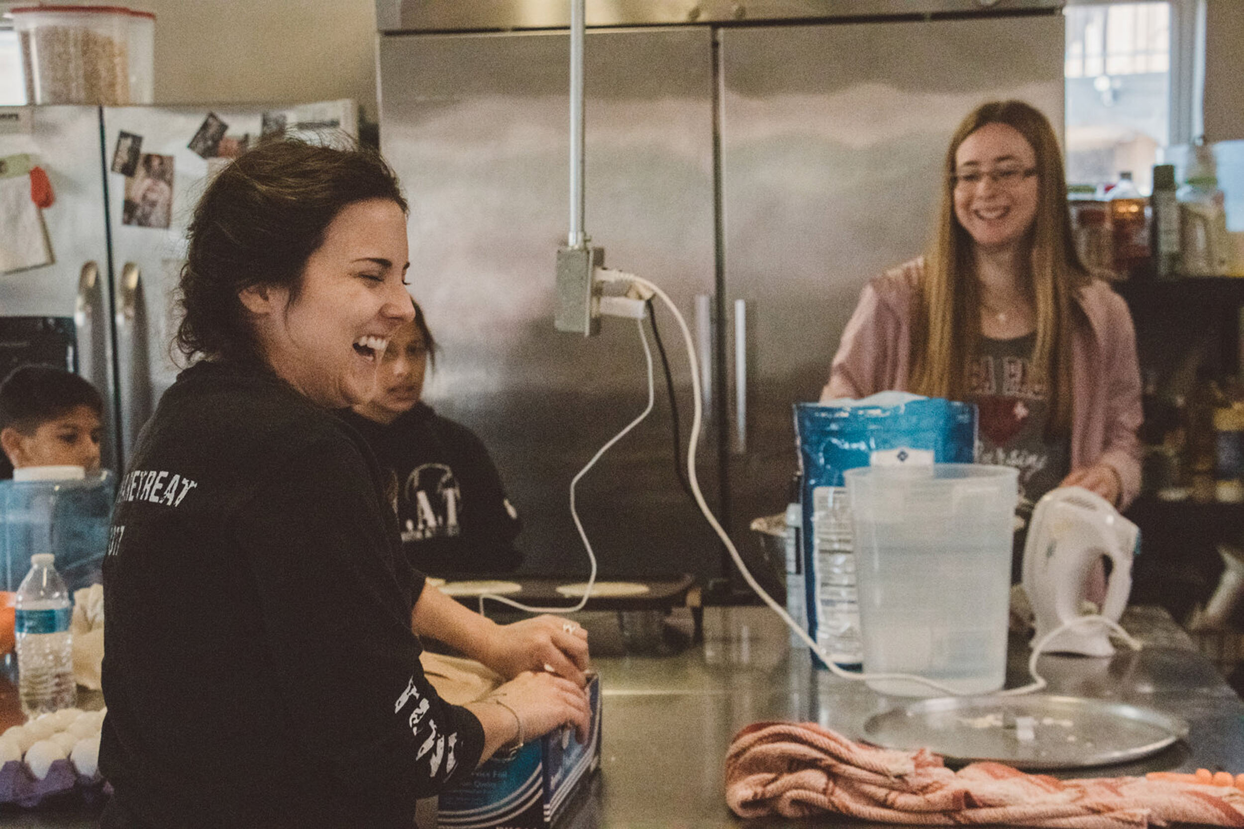 Missions-Kitchen-Laughing.jpg
