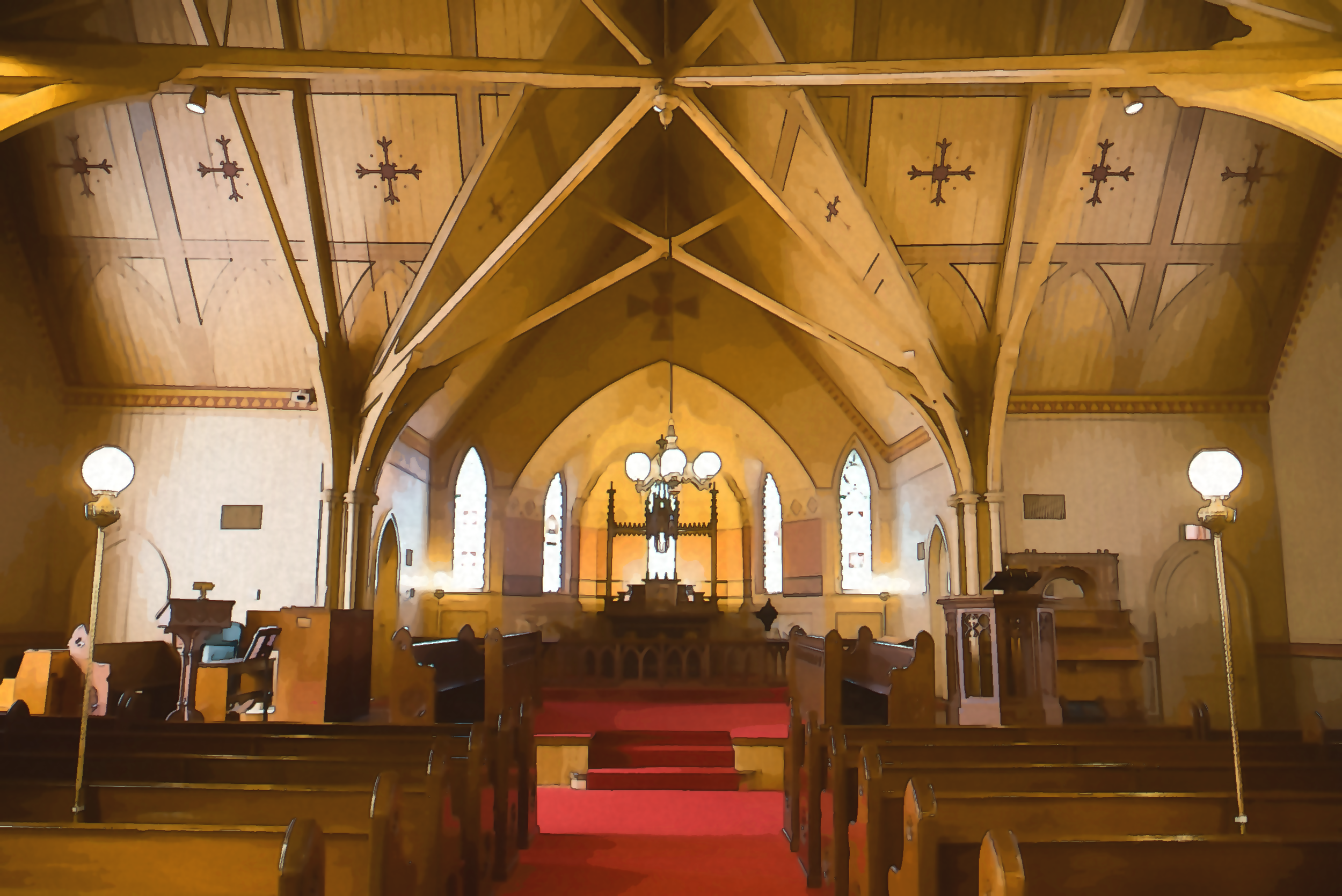 A 160 year old chapel with red carpet and wooden vaulted ceilings.