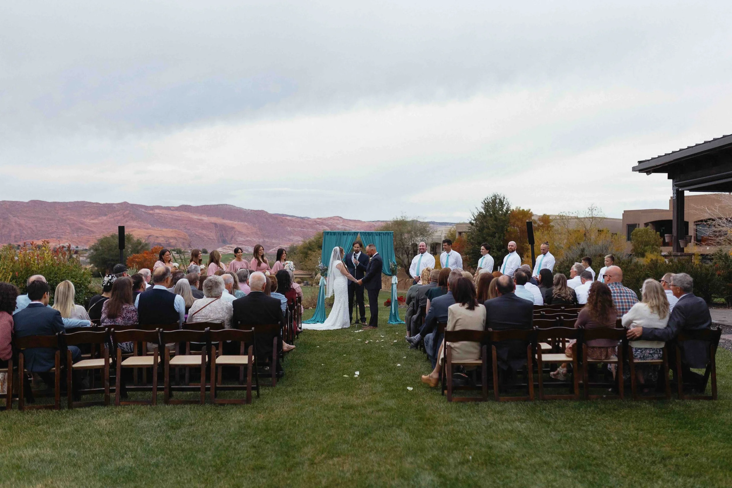 Wedding ceremony being held in St. George at the Ledges golf course.