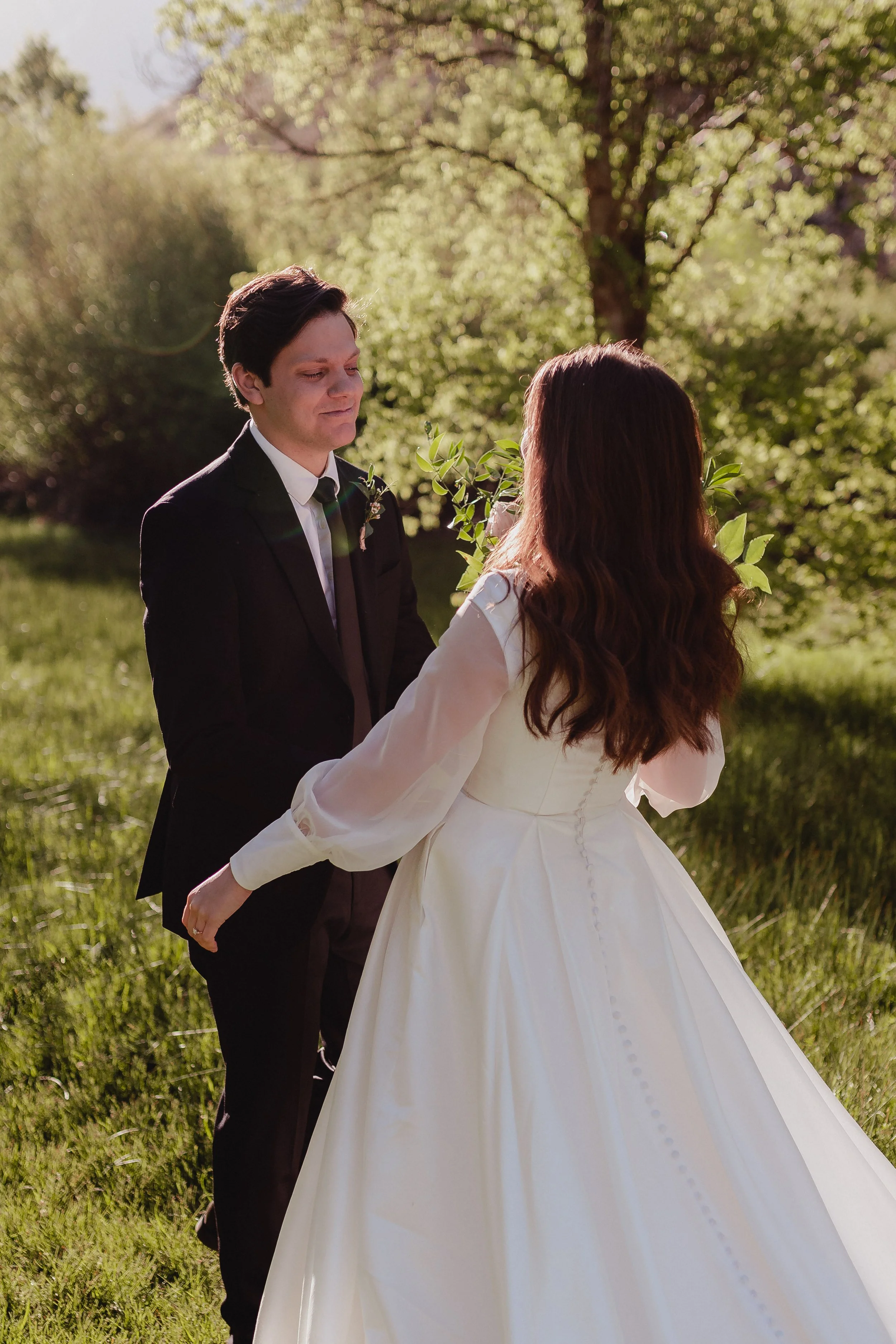 Groom starting to cry when he sees his bride for the first time