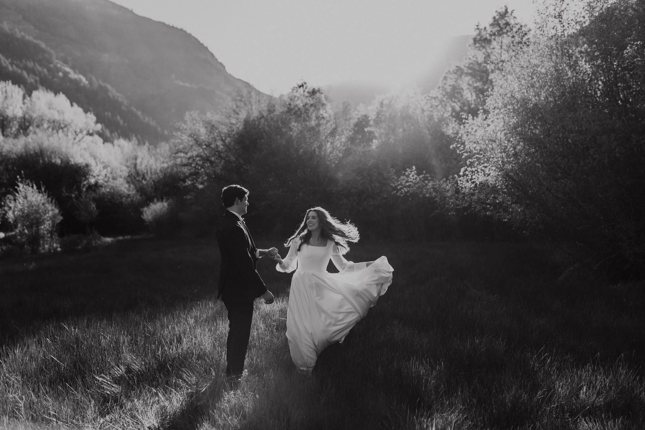 Bride and groom in a field