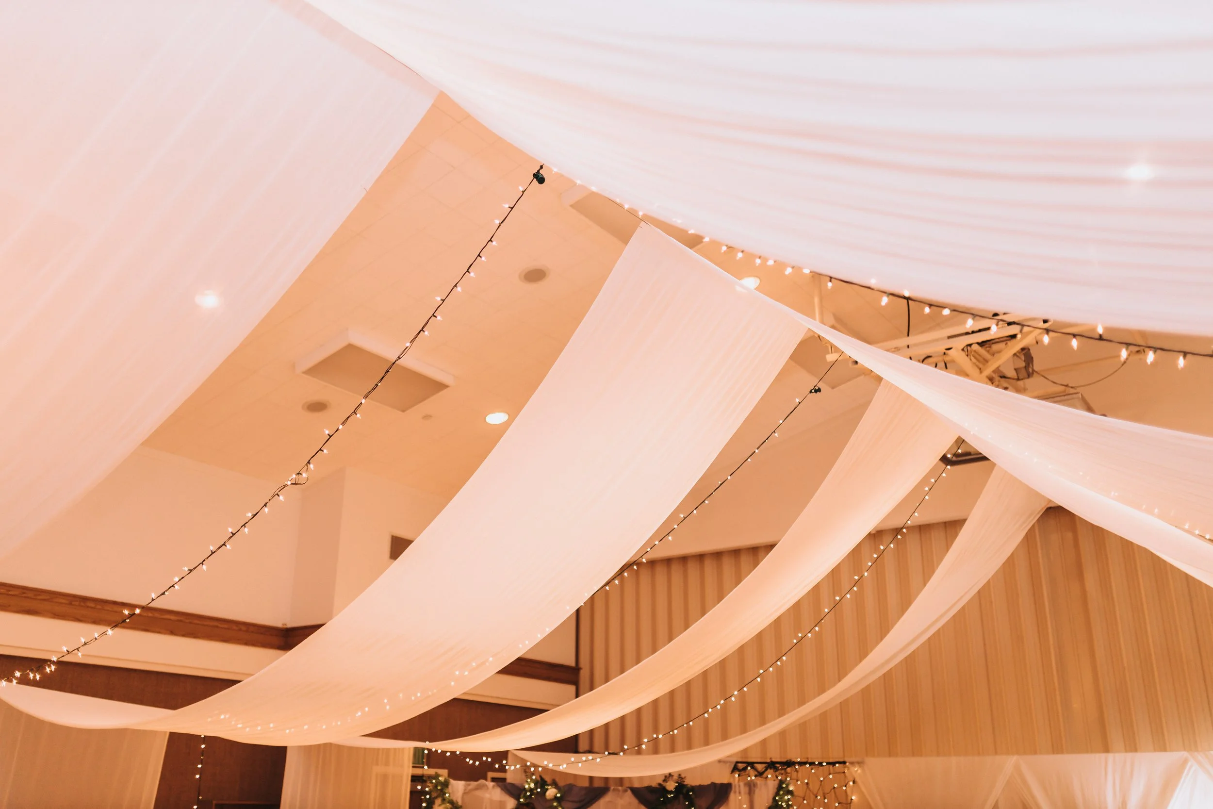 Cloth draped across the ceiling of a gym