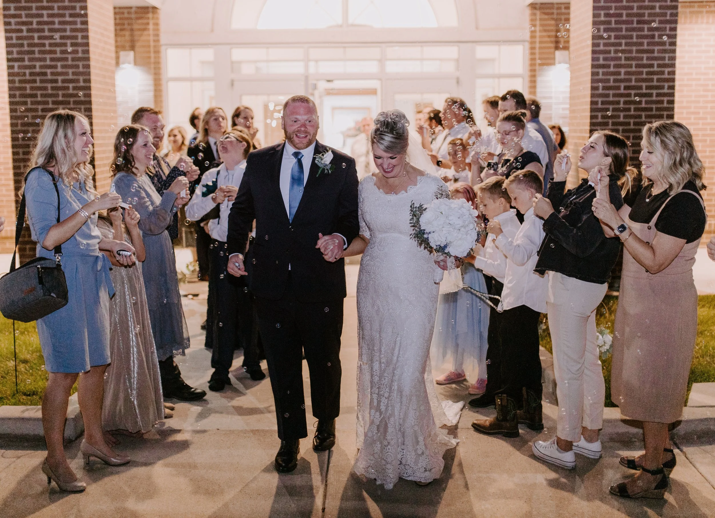 Bride and groom exiting their wedding