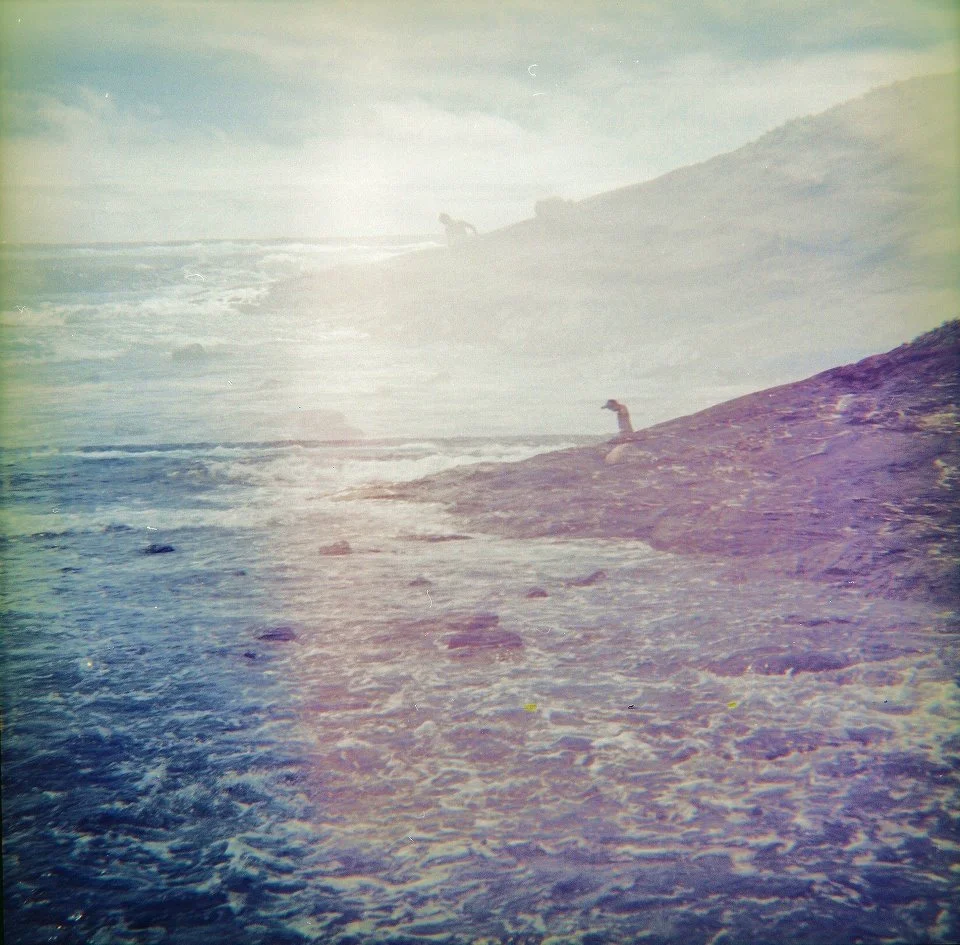 Person on shore of the beach