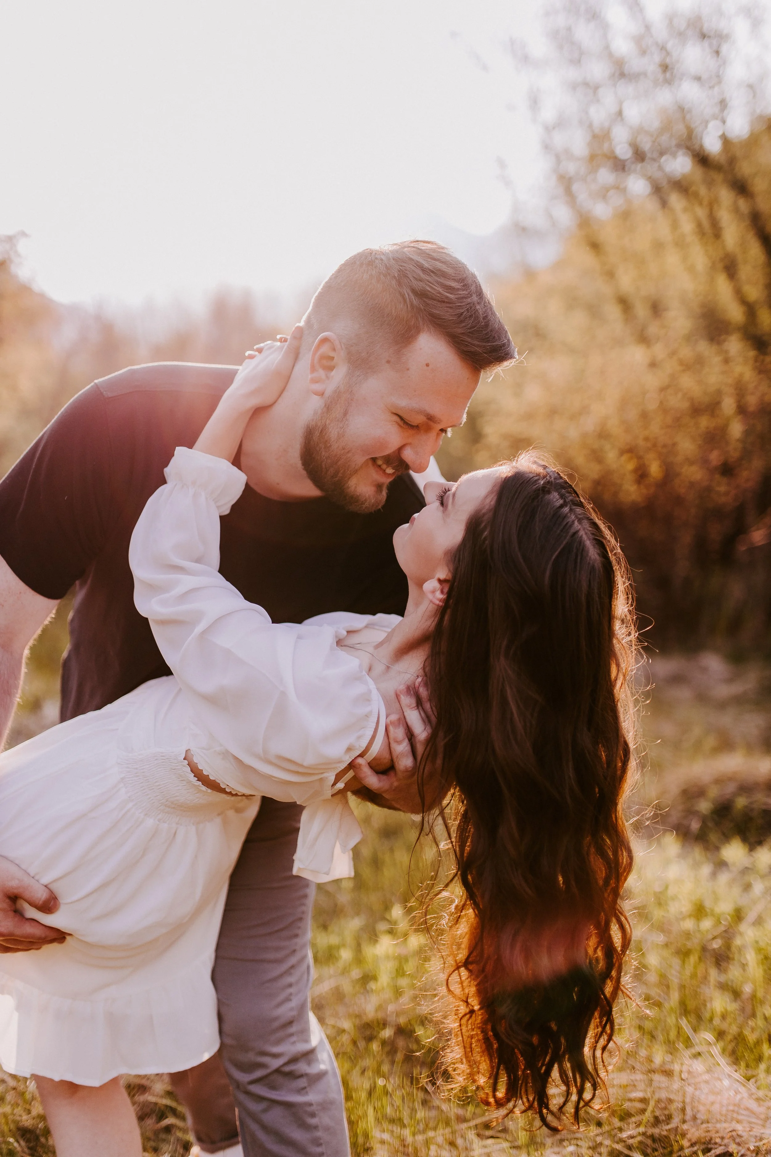 Couple dipping and smiling at each other