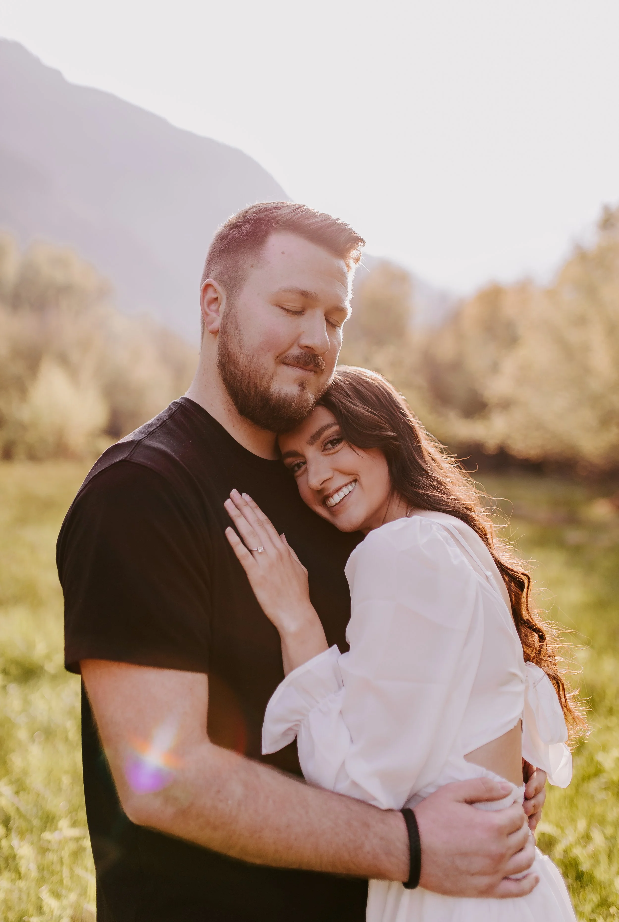 Couple embracing and smiling