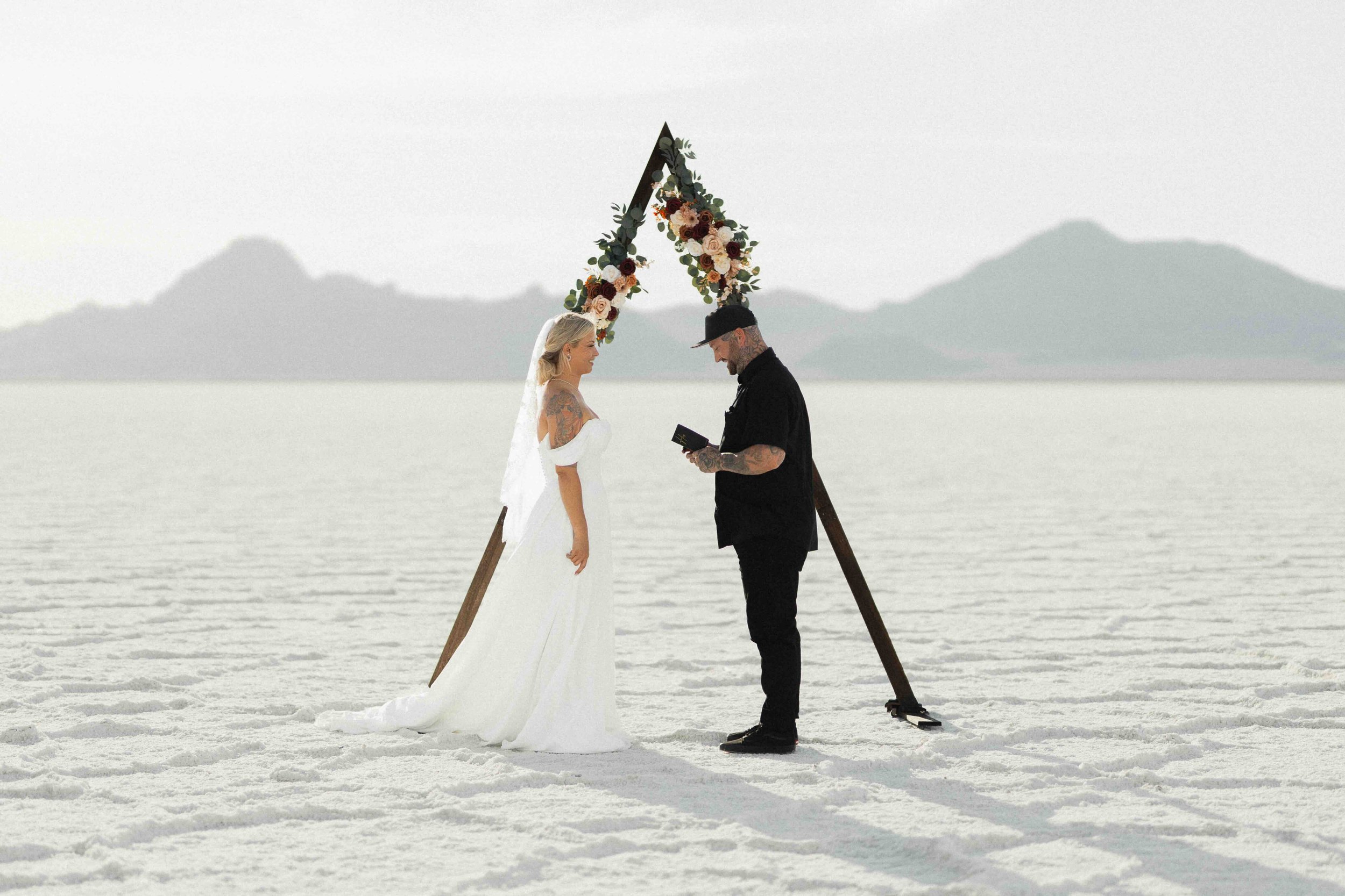 Bride and groom exchanging vows on the Bonneville Salt Flats.