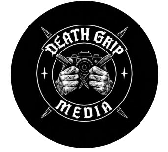 Bridal couple nuzzling in fall leaves background