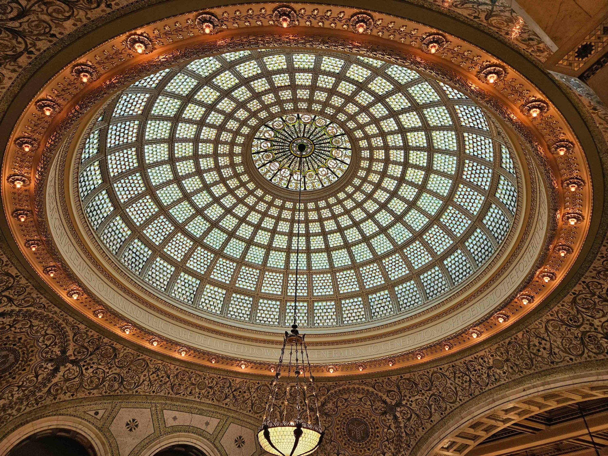 a glass dome at the top of the Chicago Cultural center building.
