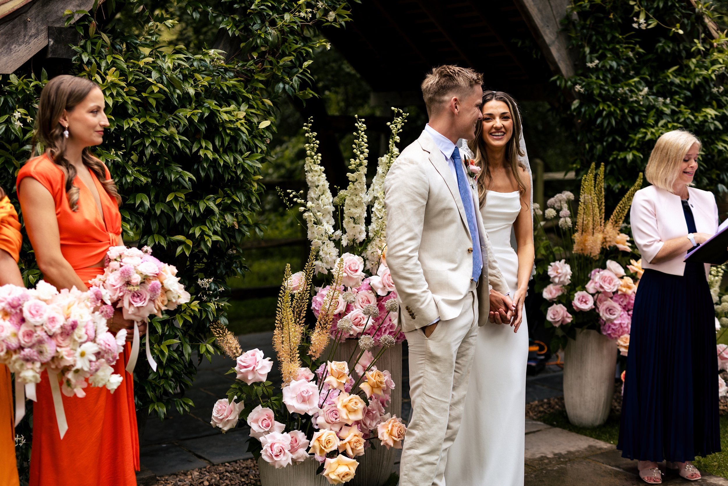 Ceremony+flowers+7+%7C+Pink+%2B+Apricot+%2B+White+%7C+Millbridge+Court+%7C+Frankie+Lane+Flowers.jpg