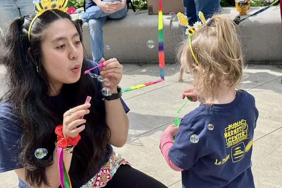 blowing-bubbles-at-walk-for-kids-eventjpg.webp