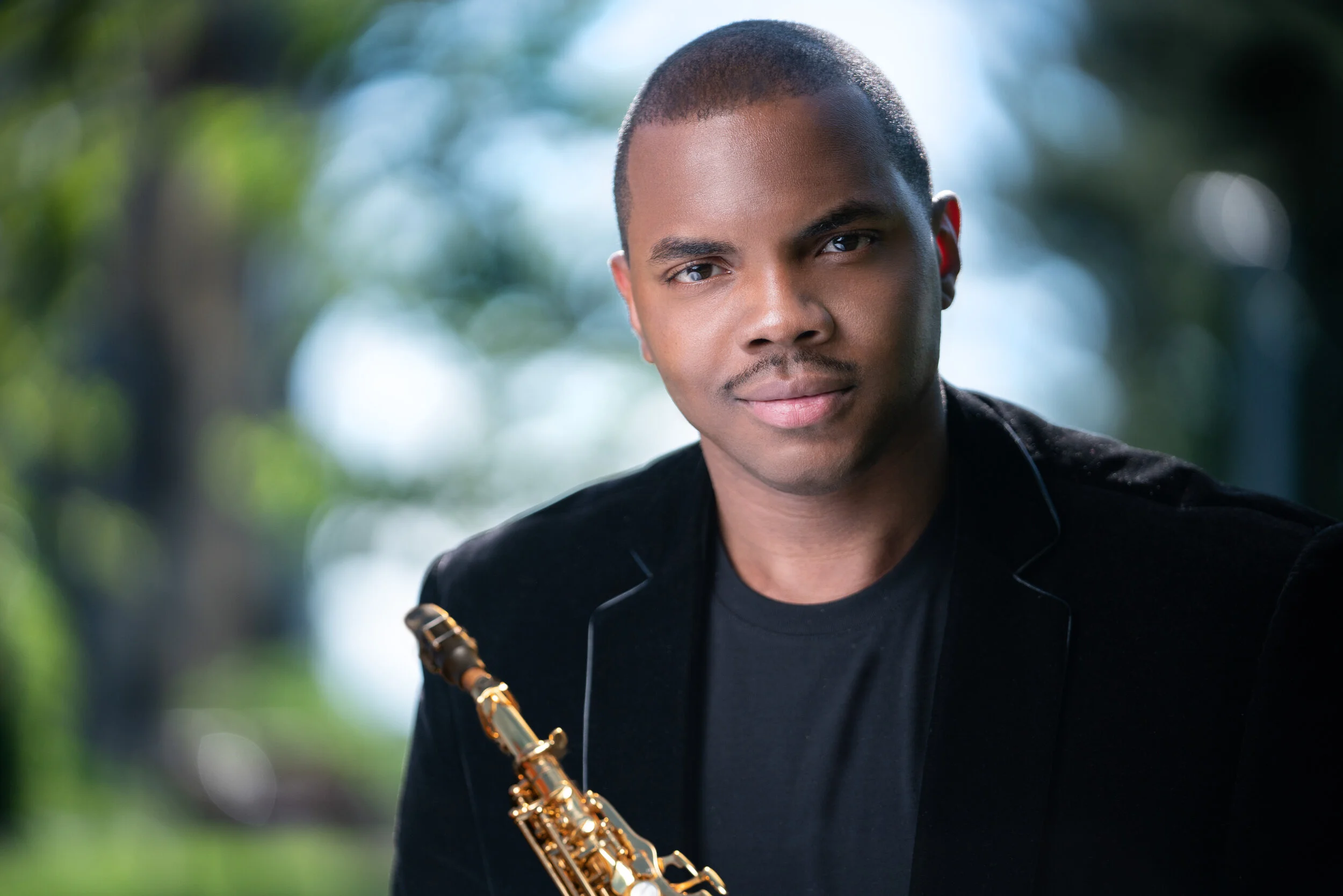 Tony Craddock, Jr. Headshot with Sax 2020.jpg