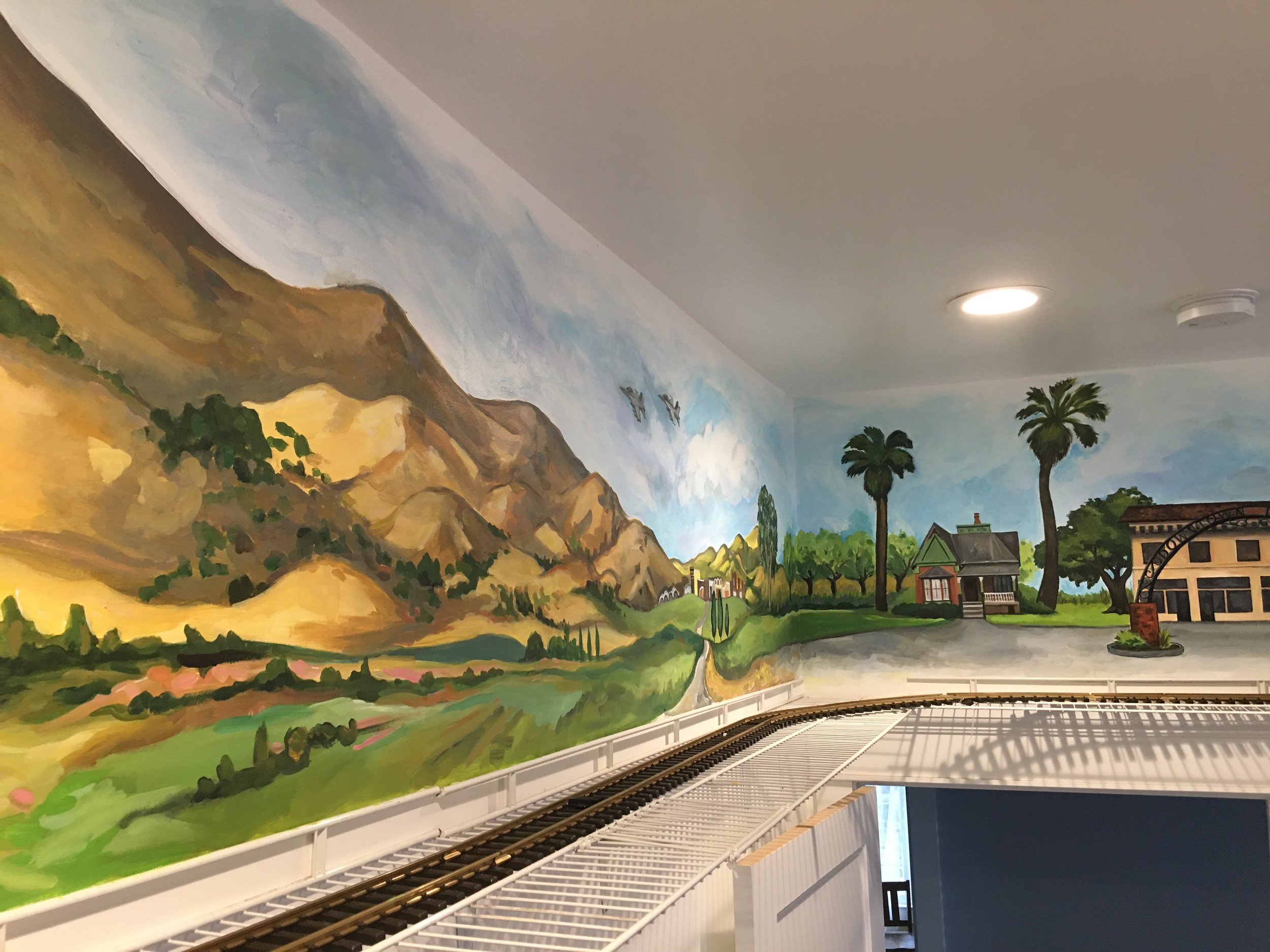 Hanford Scene Behind Electric Train Set, Children's Storybook Garden & Museum, Hanford, CA. 2021. 