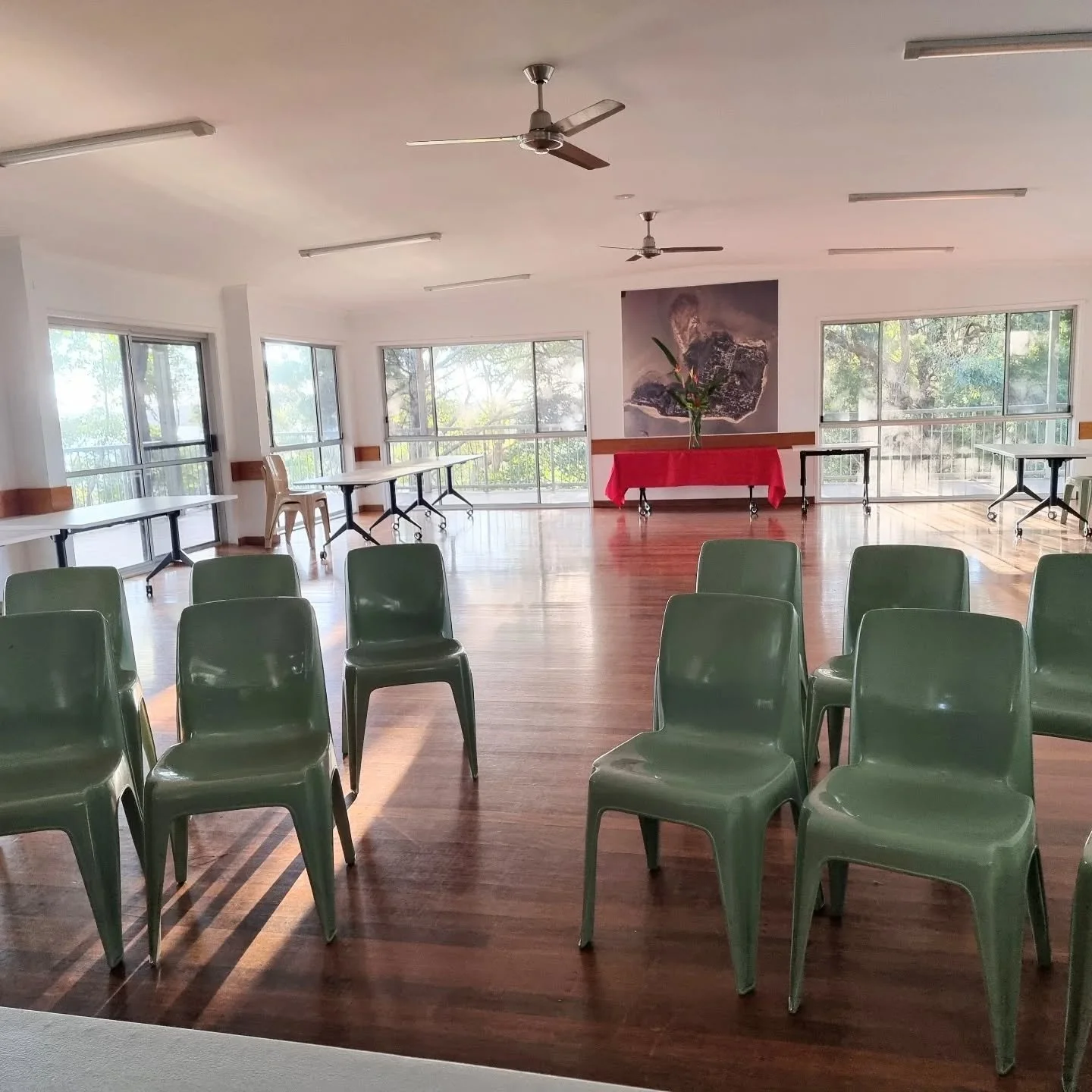Official launch this afternoon in the Coochiemudlo community hall. Playing around with chair set up.  Eighty-two coming! Some by ferry, some by motor boat, then there's the overwhelming support of Coochie locals bringing flowers, food, spare chairs i