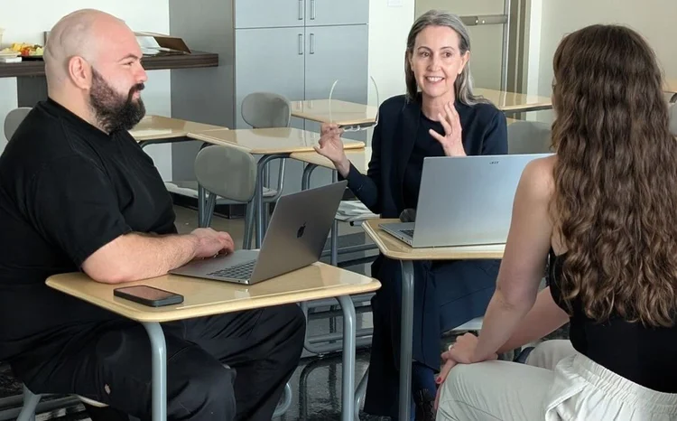 Three Sentio MFT faculty members in a small-group discussion