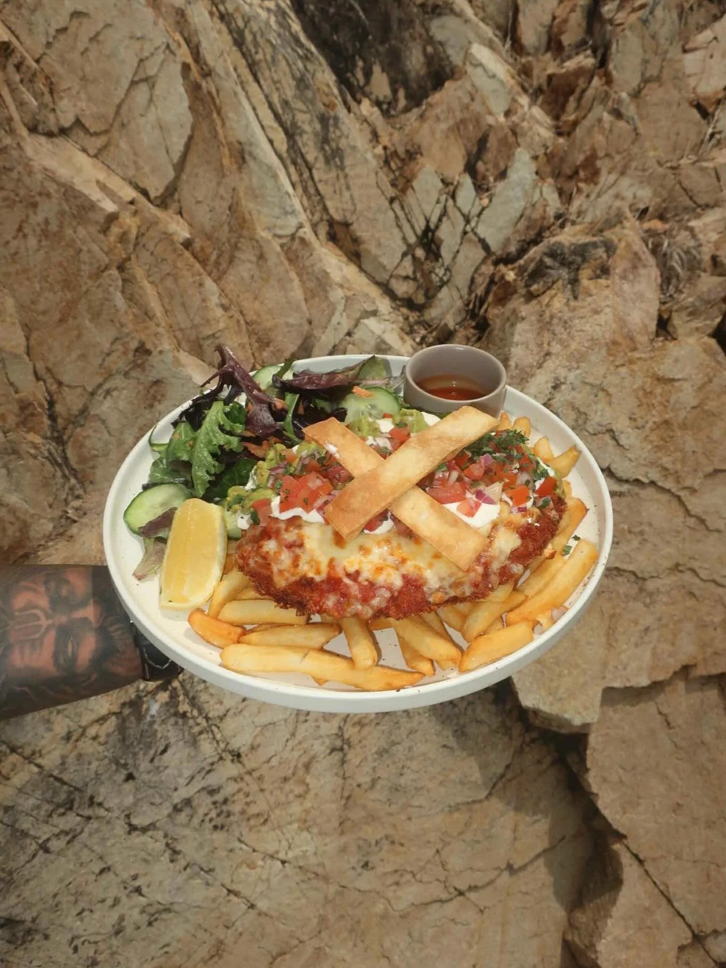 Spice up your week with our loaded Mexican Chicken Parmi 🇲🇽🌮

Topped with cheese, sour cream, guacamole, tortillas and a side of hot sauce 🔥 and don&rsquo;t forget the UNLIMITED chips!