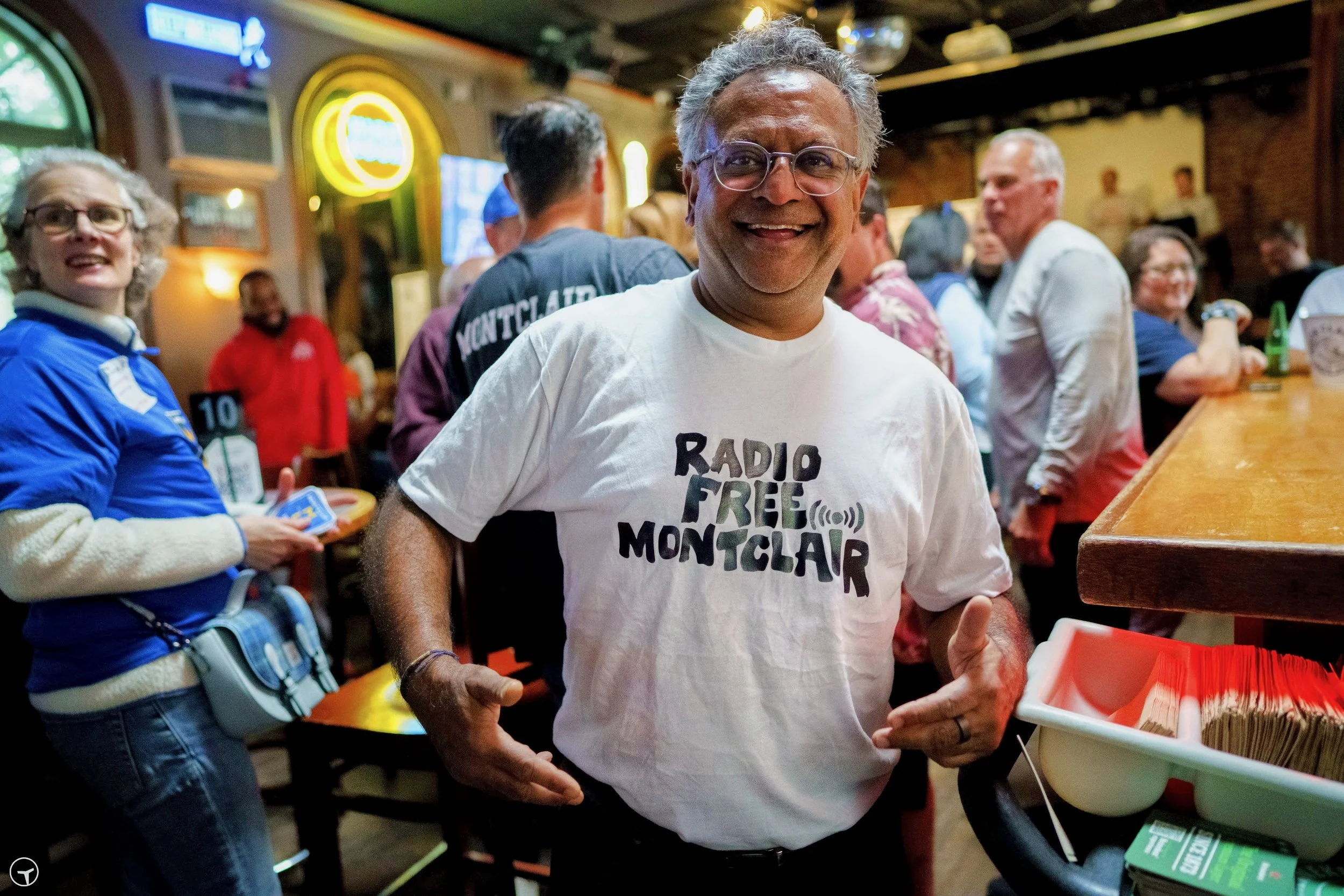 Ritesh Patel at Just Jake's in Montclair, NJ wearing a Radio Free Montclair shirt