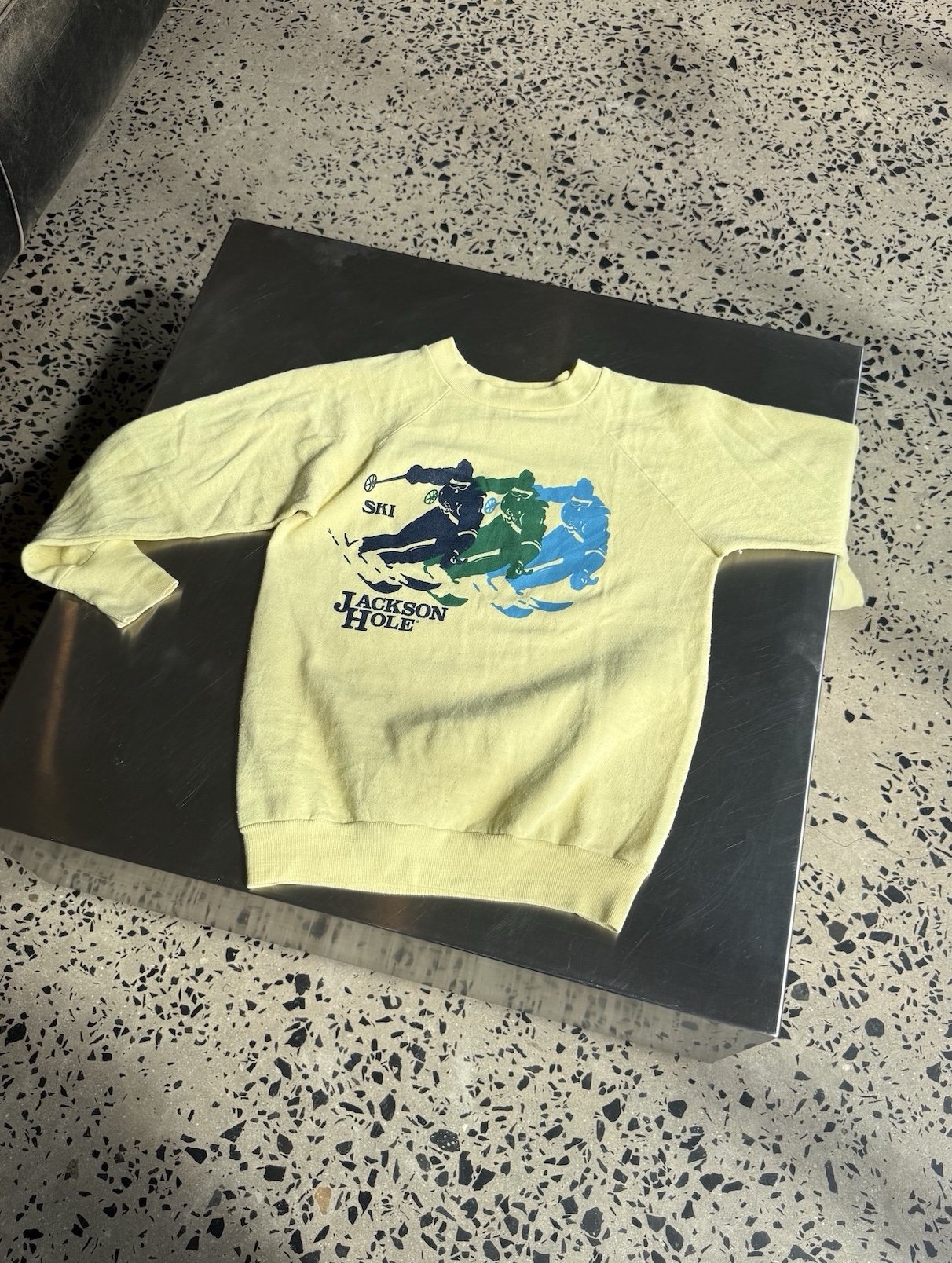 vintage-jackson-hole-ski-yellow-sweatshirt-flatlay.jpeg