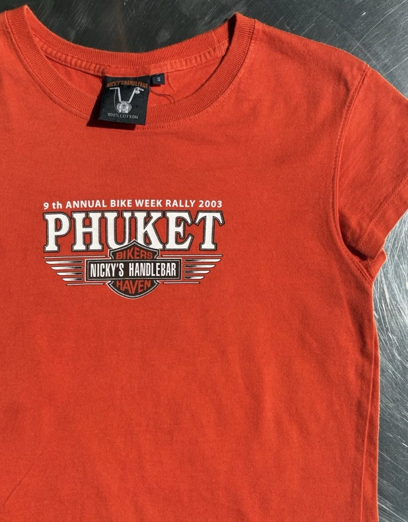 Nicky's Handlebar neck label and Phuket Bike Week 2003 print on vintage orange t-shirt