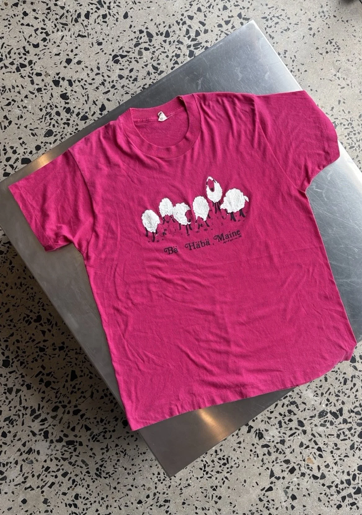 Vintage pink Bä Häbä Maine sheep t-shirt laid flat, full front view