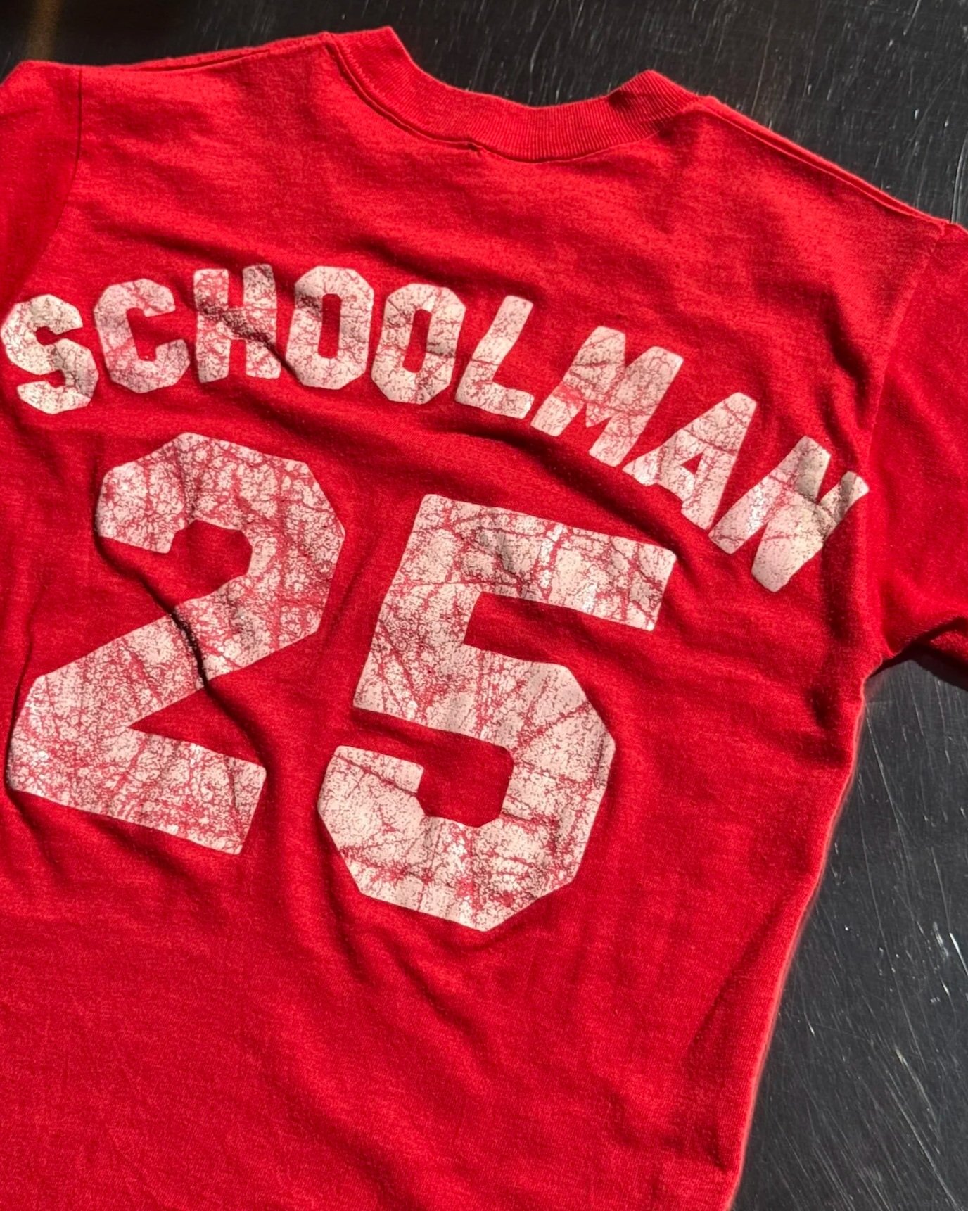 Back of vintage 80s red softball t-shirt showing Schoolman 25 print