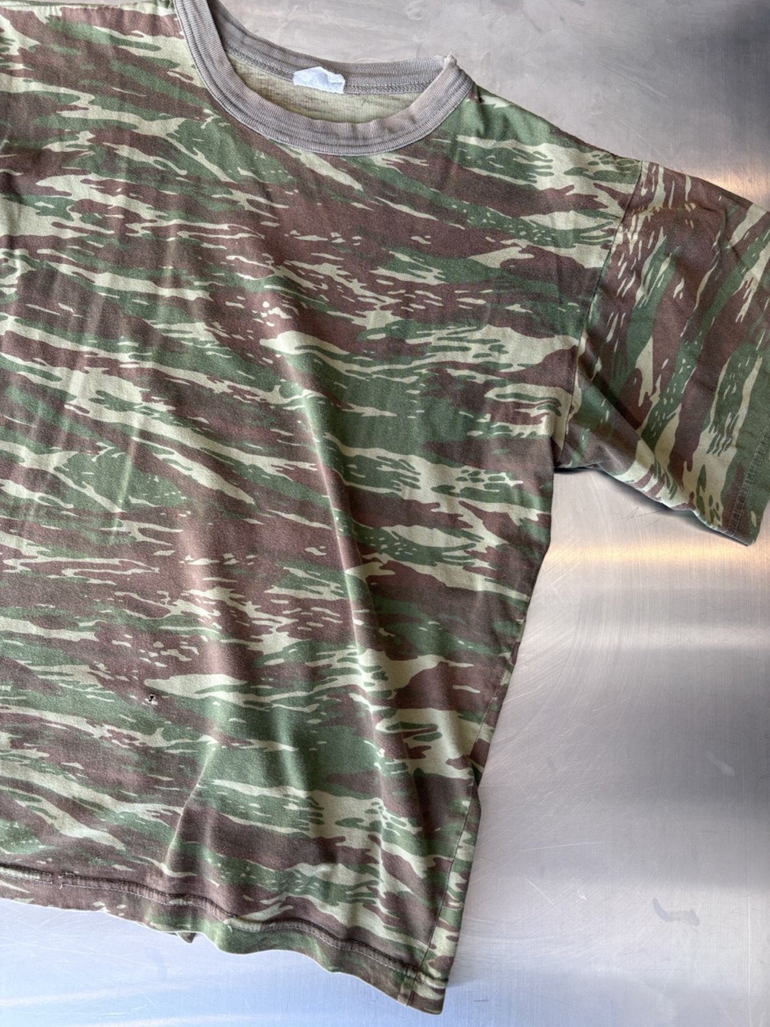 Collar and shoulder detail on vintage camo t-shirt