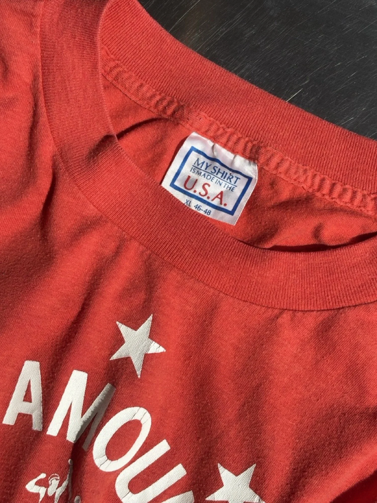 Neck label detail on vintage faded red Seamount Wrestling t-shirt, made in USA