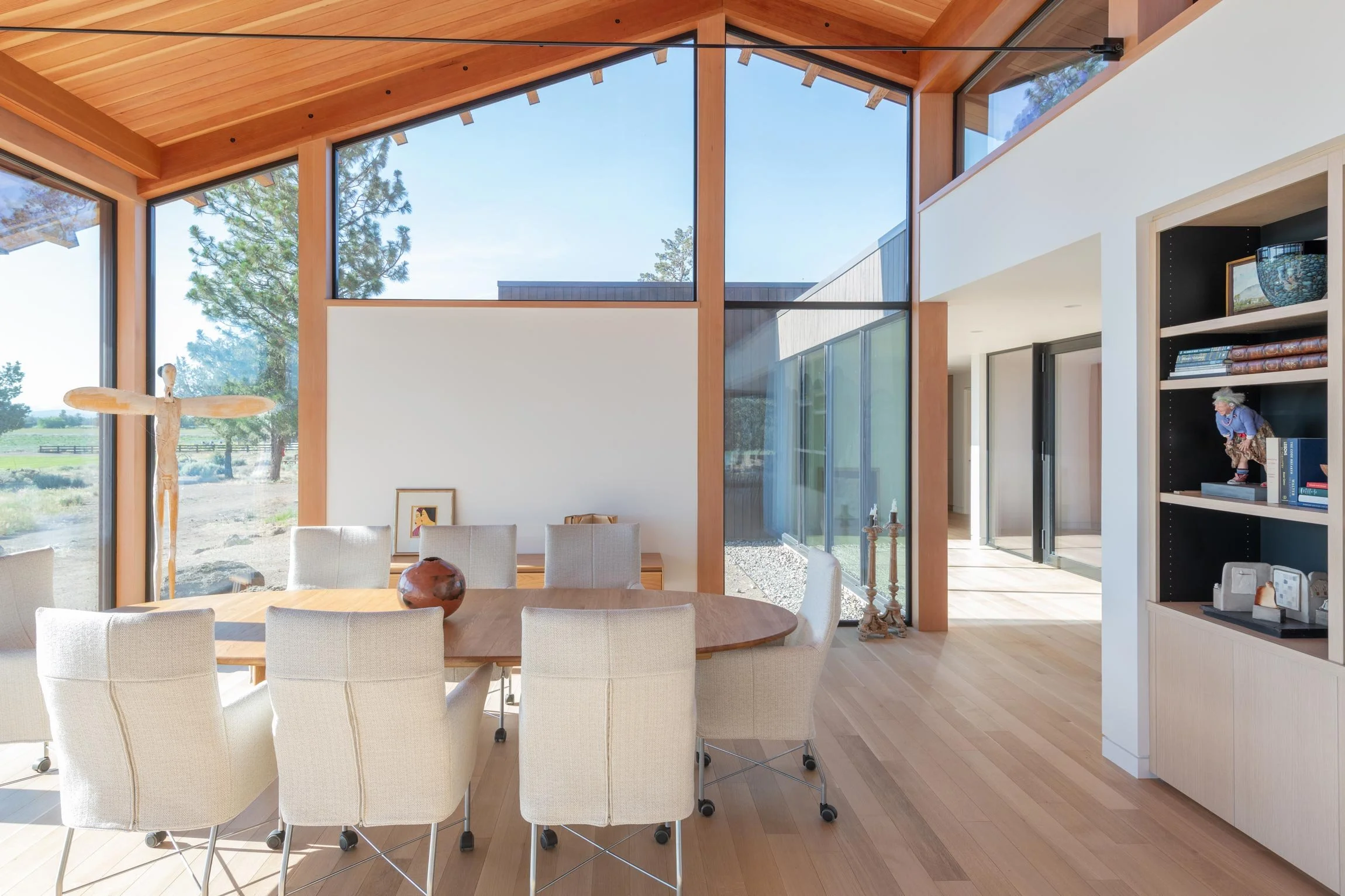 Dining room with natural light and floor to ceiling windows
