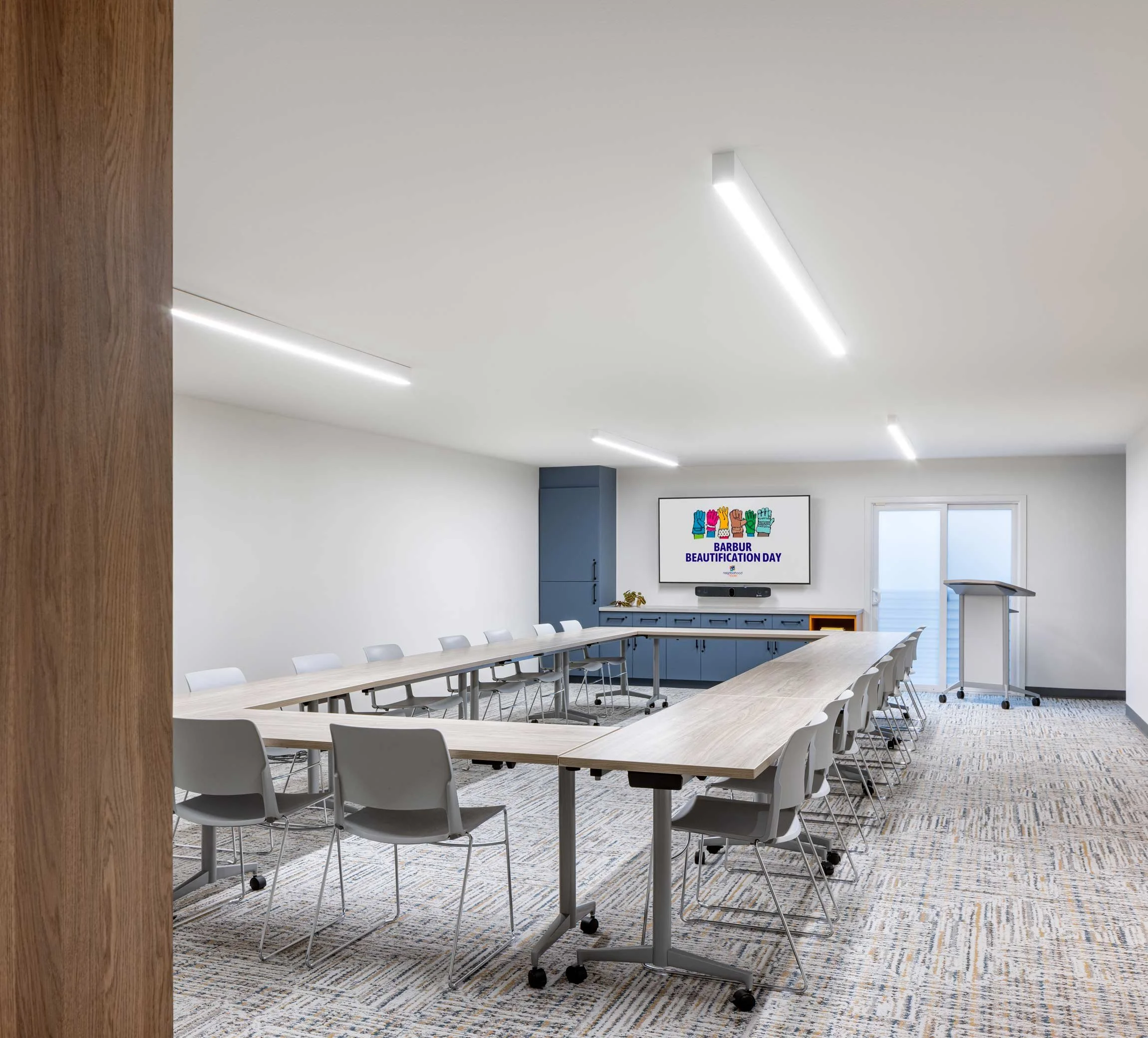 Conference and meeting room with large moveable tables and chairs