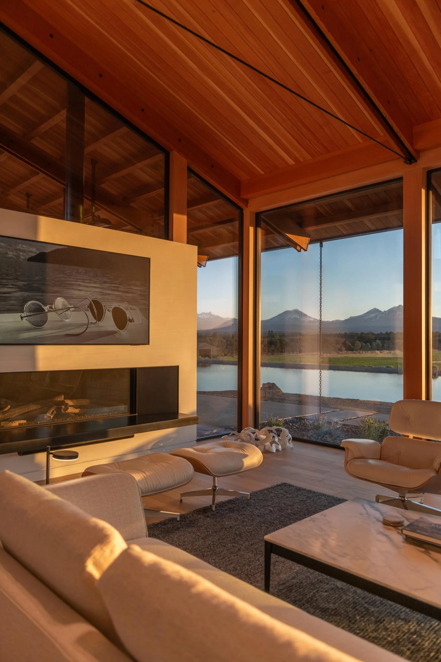 Living room and fireplace with mountain views