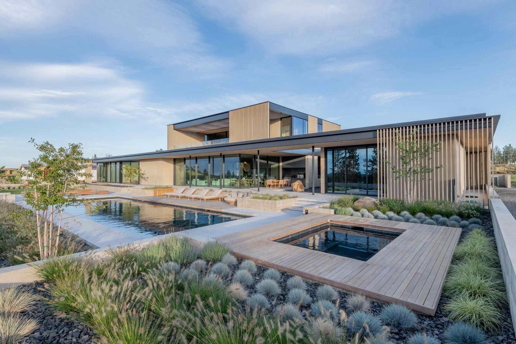 Backyard with pool, hot tub, and large patio