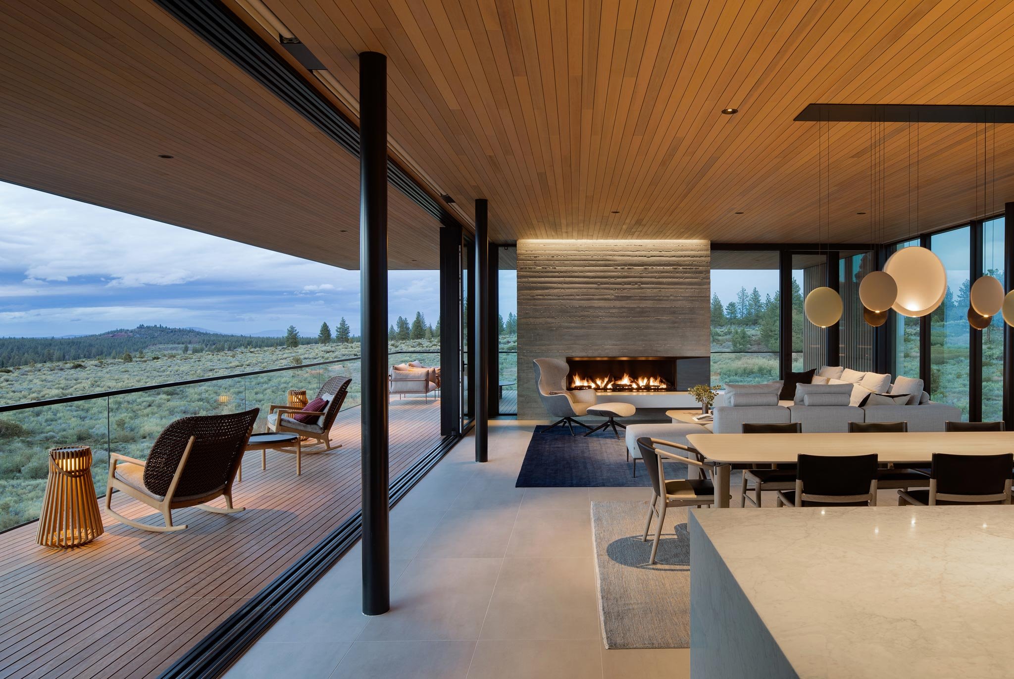 Living room with open wall to outdoor deck