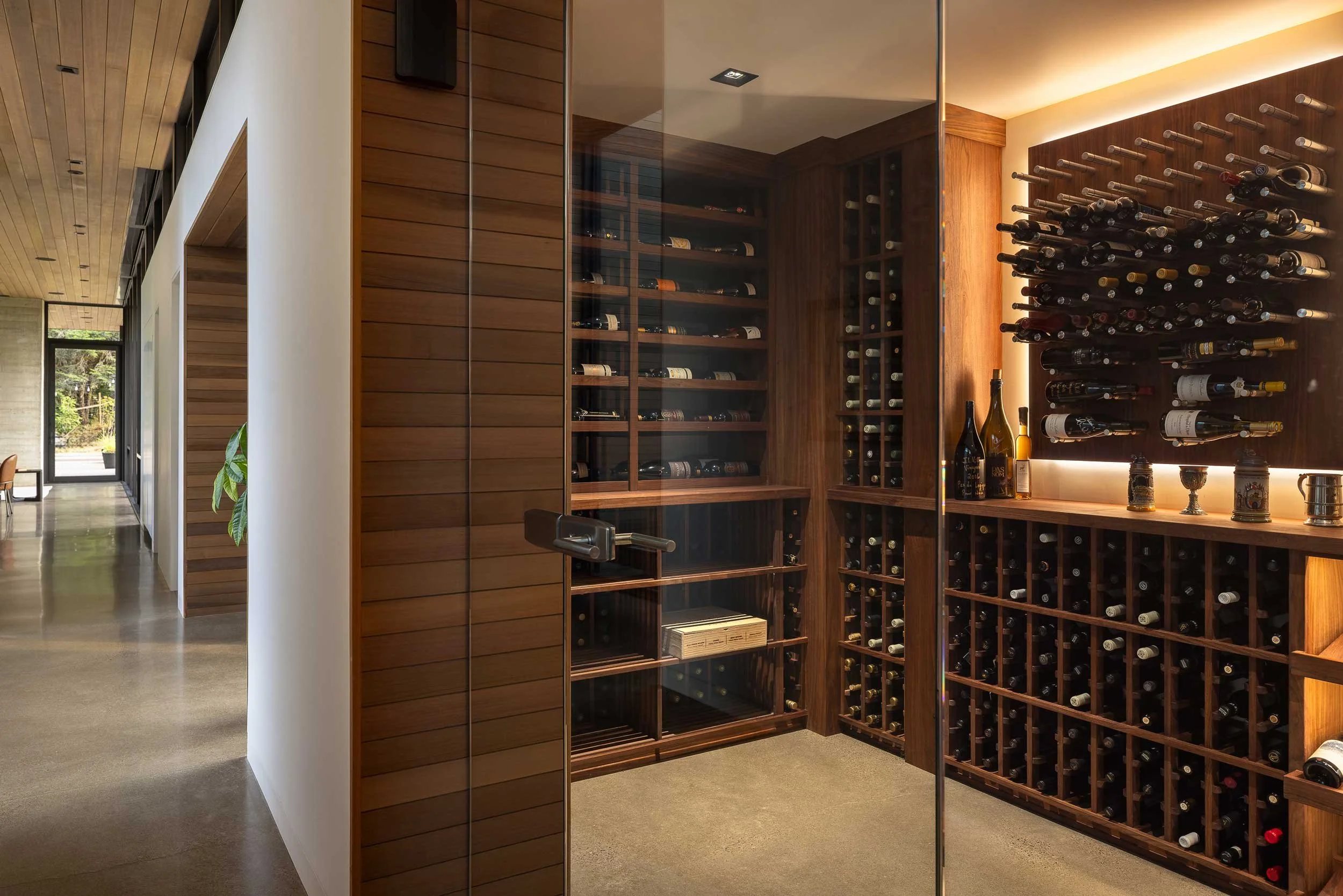 large wine room with glass doors