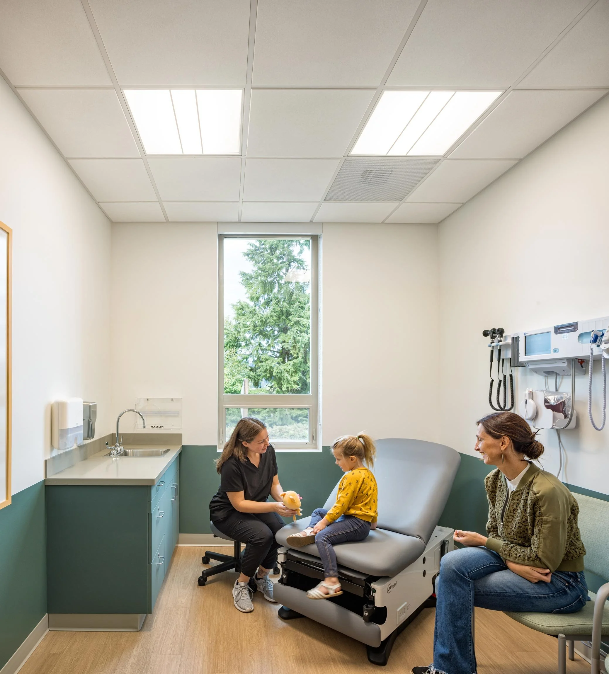 Patient and doctor in exam room