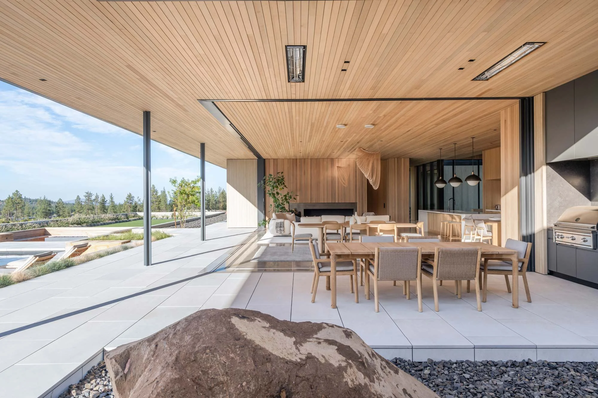 Living space with large window wall open to the outdoors