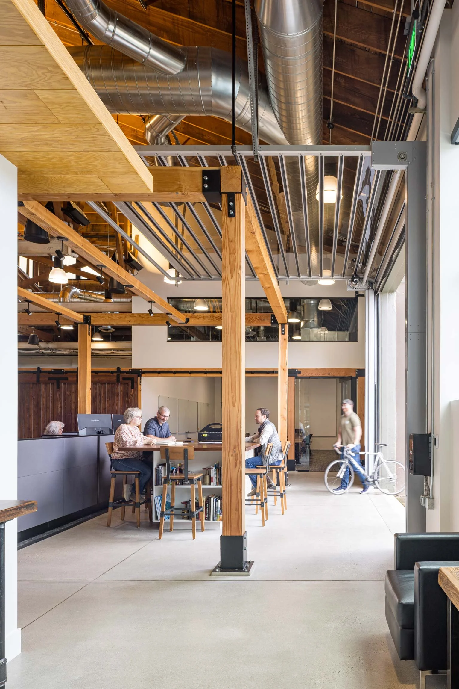 View of meeting area with open garage door