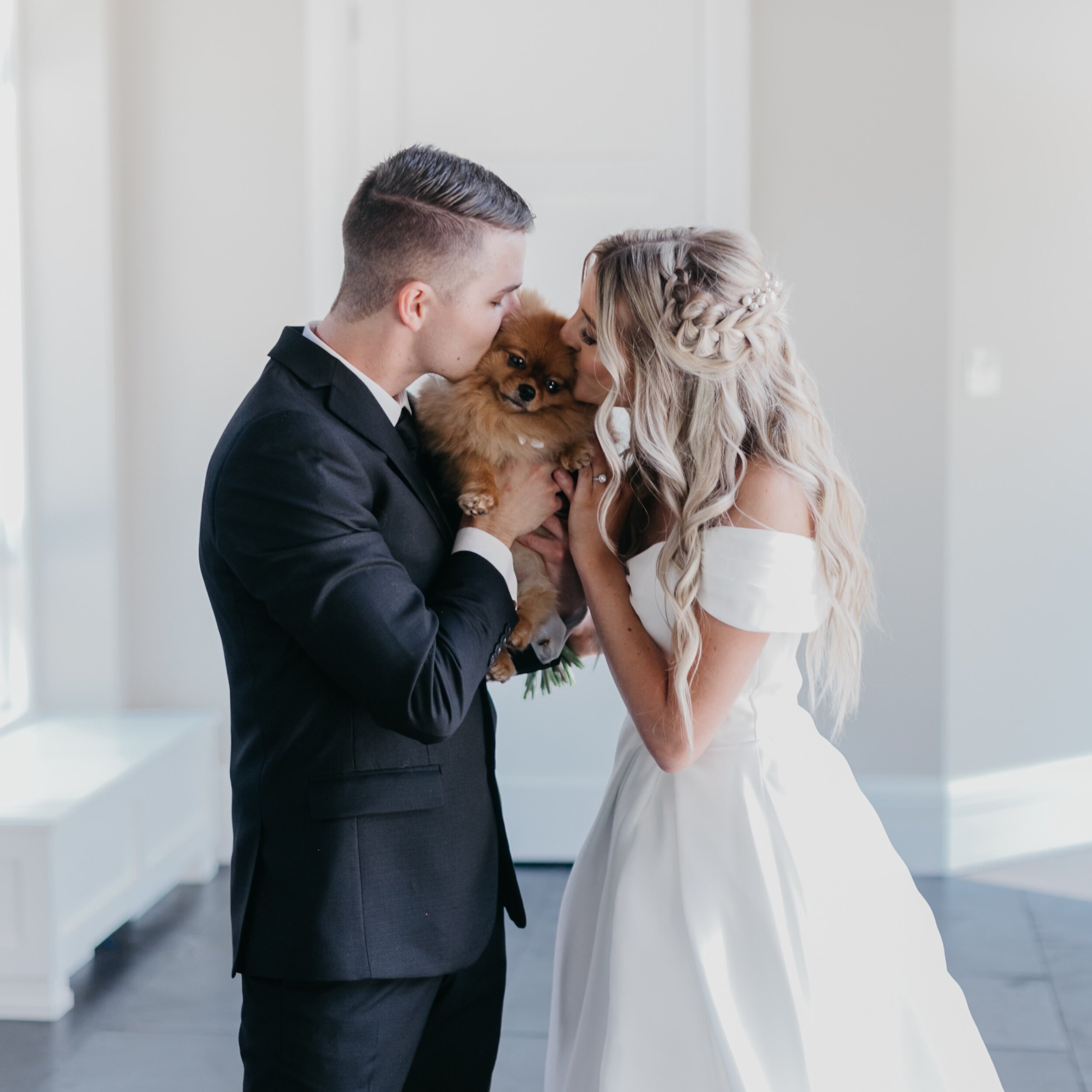 Pawsitively in love! 🐾💖 Michel and Patricia steal a sweet moment with their beloved fur baby on their joy-filled wedding day 😍.