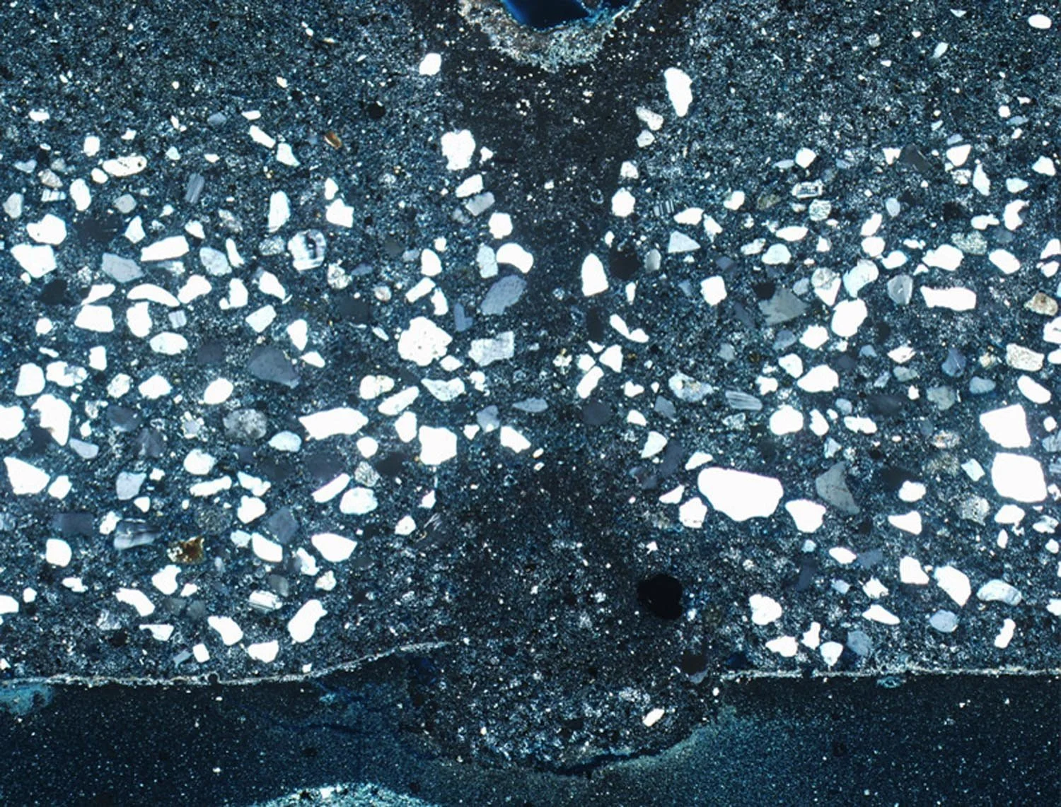 XPL photomicrograph of self-leveling compound for terrazzo flooring