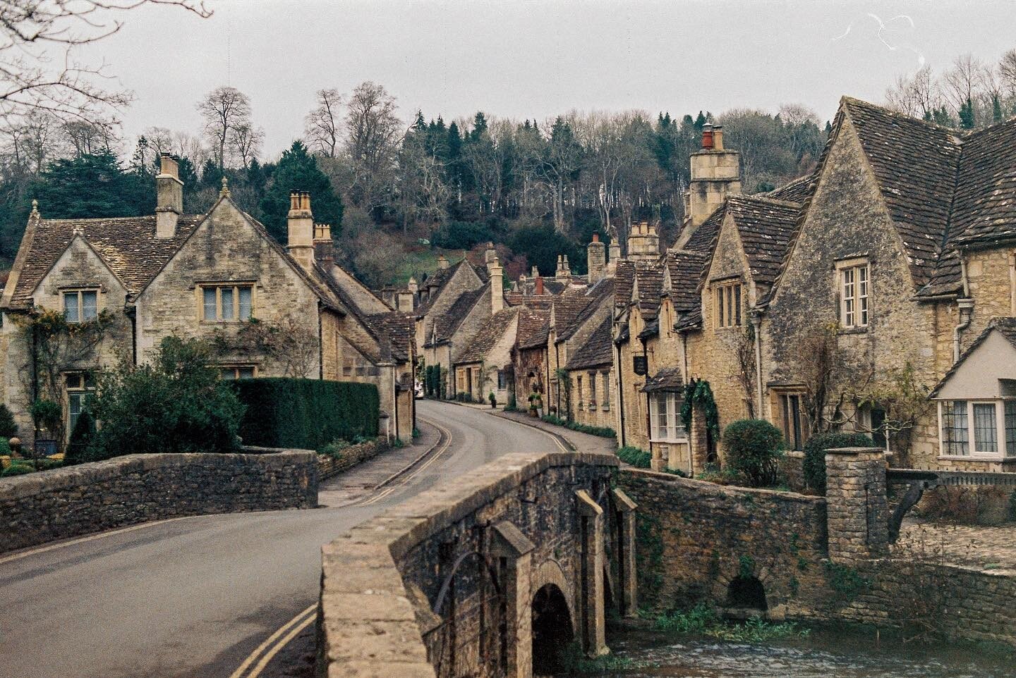 Feeling very excited as @barnygreen, Noah and I are off to Snowdonia tomorrow for a week of adventures. So here&rsquo;s a dreamy film photo of Castle Combe from our previous getaway 🤍